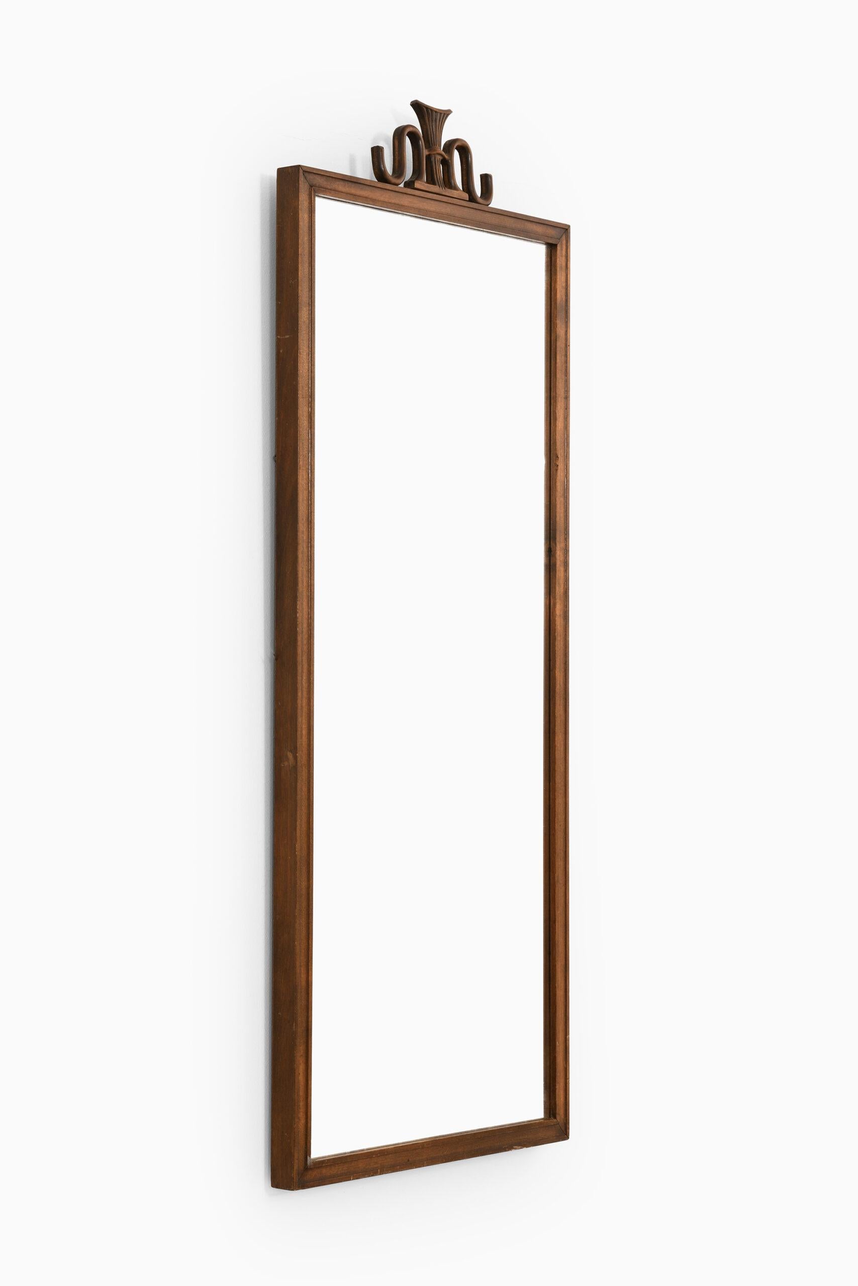 Miroir d'un designer inconnu. Produit par SMF à Bodafors, en Suède.