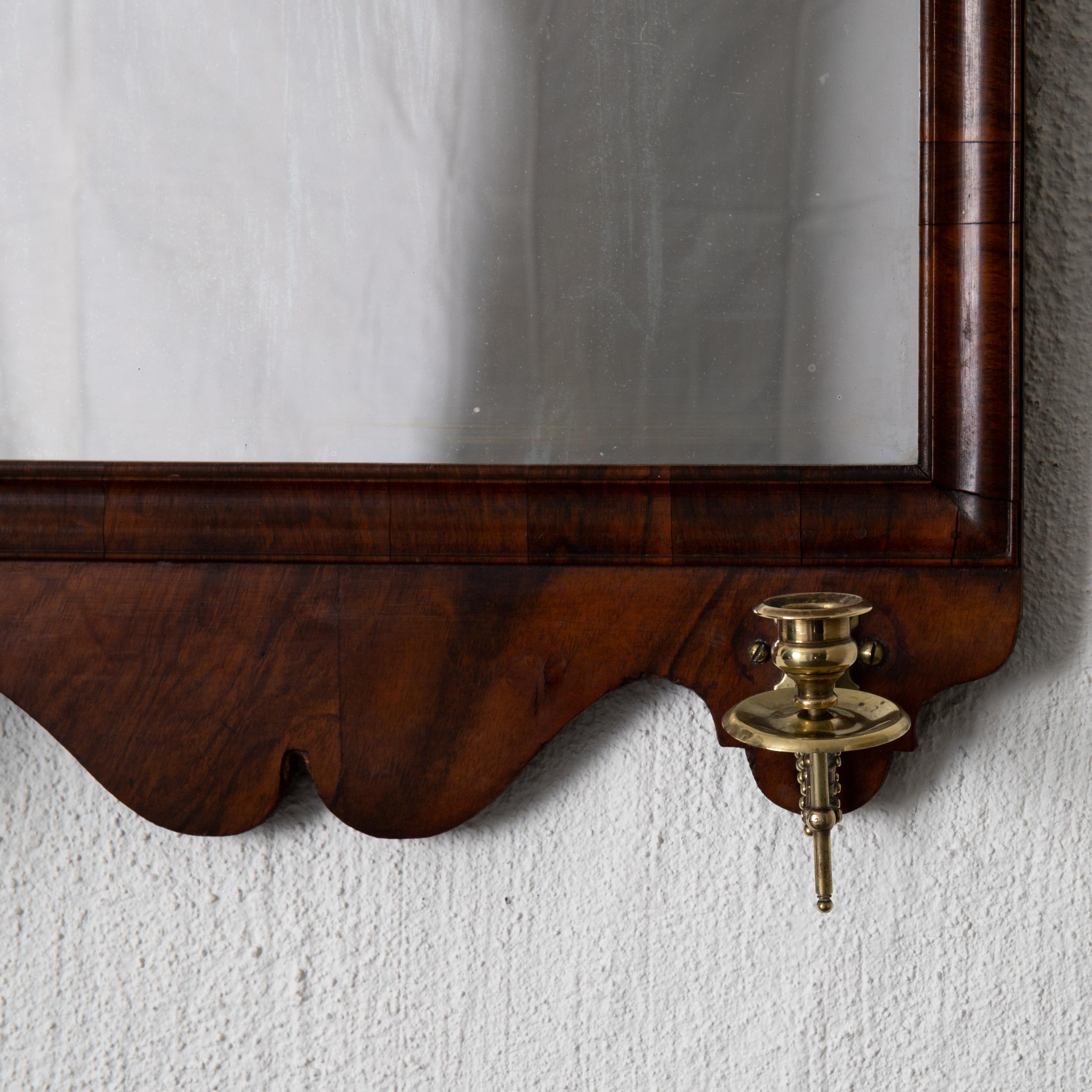 Mirror sconce large English 18th century mahogany 2 candleholders England. Frame in dark brown mahogany. Two candleholders extendable in brass.