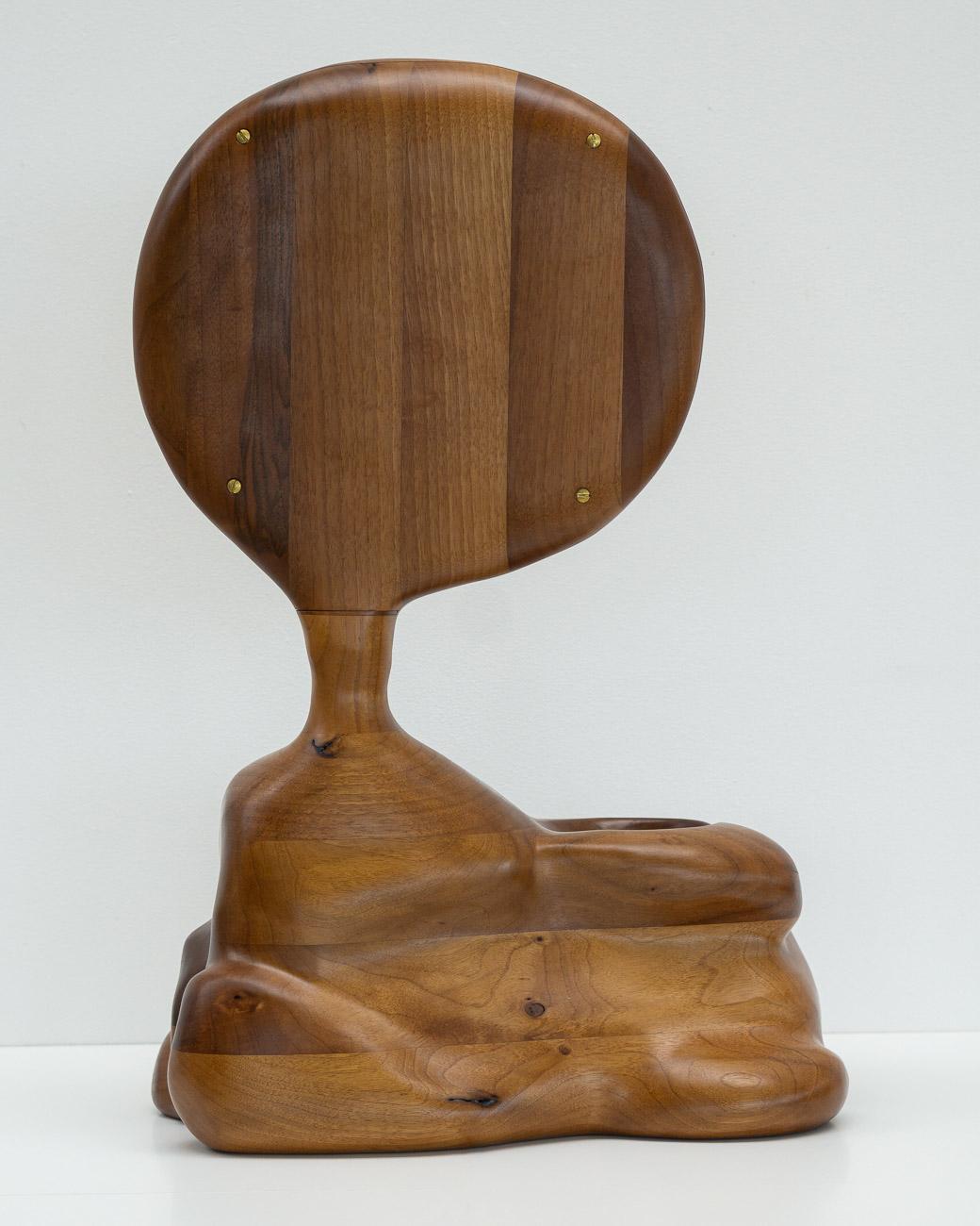 Mirror Sculpture in Walnut Wood with Smooth Finish by Alexander Knysch
Dimensions: 80x50x20
Materials: Walnut Wood.

Alexander was born in Kazakhstan in 1990 and moved to Germany at the age of 4, where he grew up near Stuttgart with his parents and
