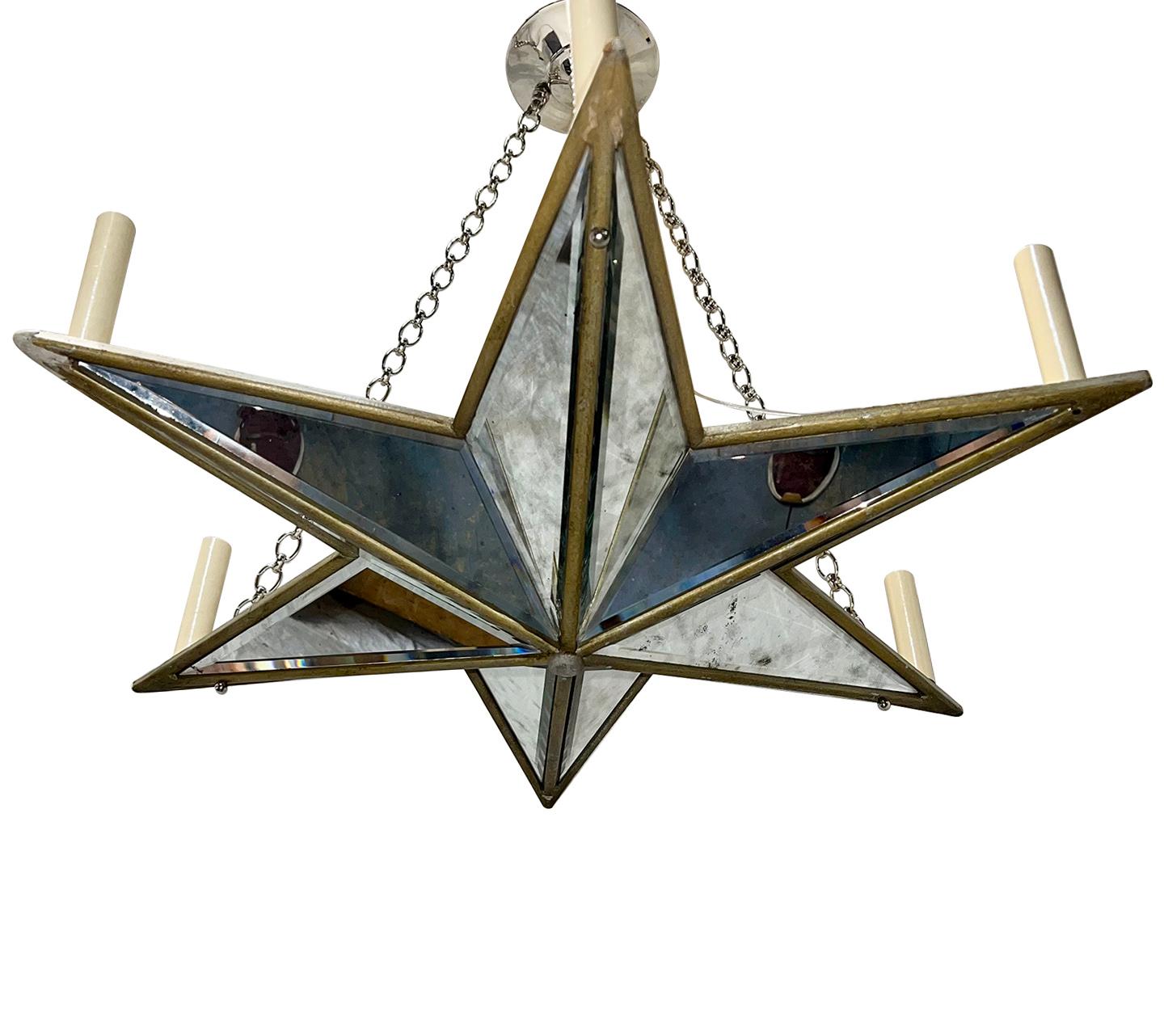 A circa 1960's French star shaped chandelier with 6 lights.

Measurements:
Present Drop: 25
