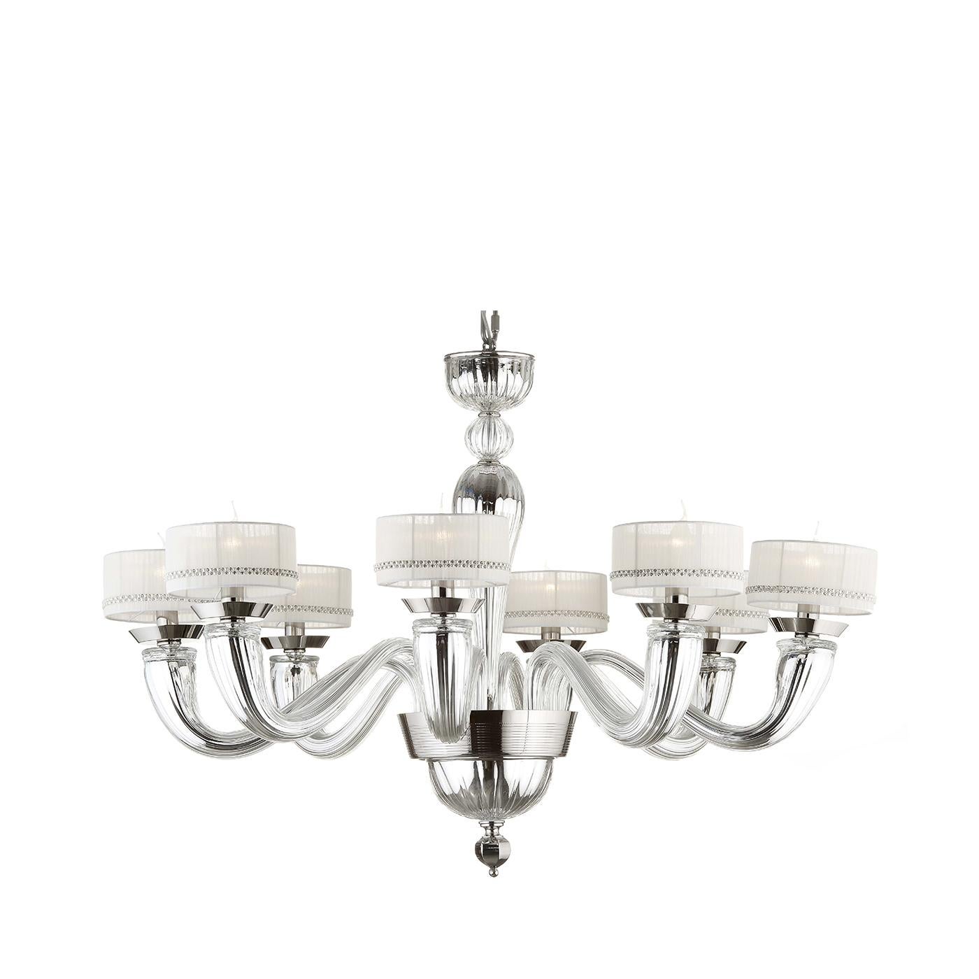 Effortlessly blending Traditional Design and contemporary allure, this chandelier combines centuries-old Venetian glass hand-manufacturing with a modern touch for a timeless chandelier that will make a statement in any decor. Hand-worked metal with