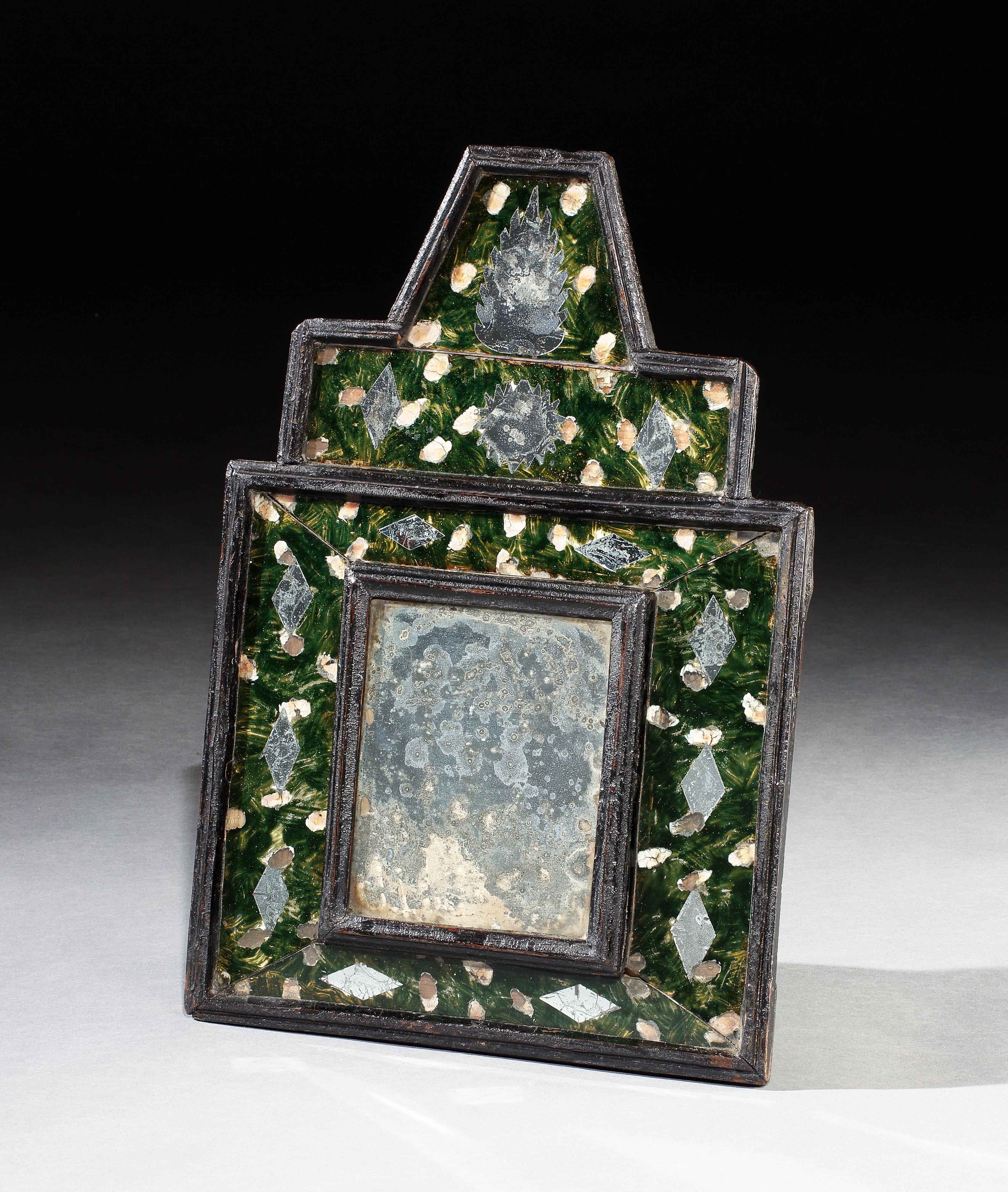 Exceptional, museum quality, late-renaissance, english, ebonised pine and reverse painted wall mirror with its original plate & inlaid mirror pieces in the frame.

-This is an exceptionally rare, early example of a luxury item combining reverse