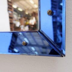 Mirror with a colored glass frame attributed to Fontana Arte, Italy, circa 1950