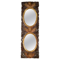 Antique Mirror with angel heads. Carved and polychrome pine wood. Spanish school, 18th c