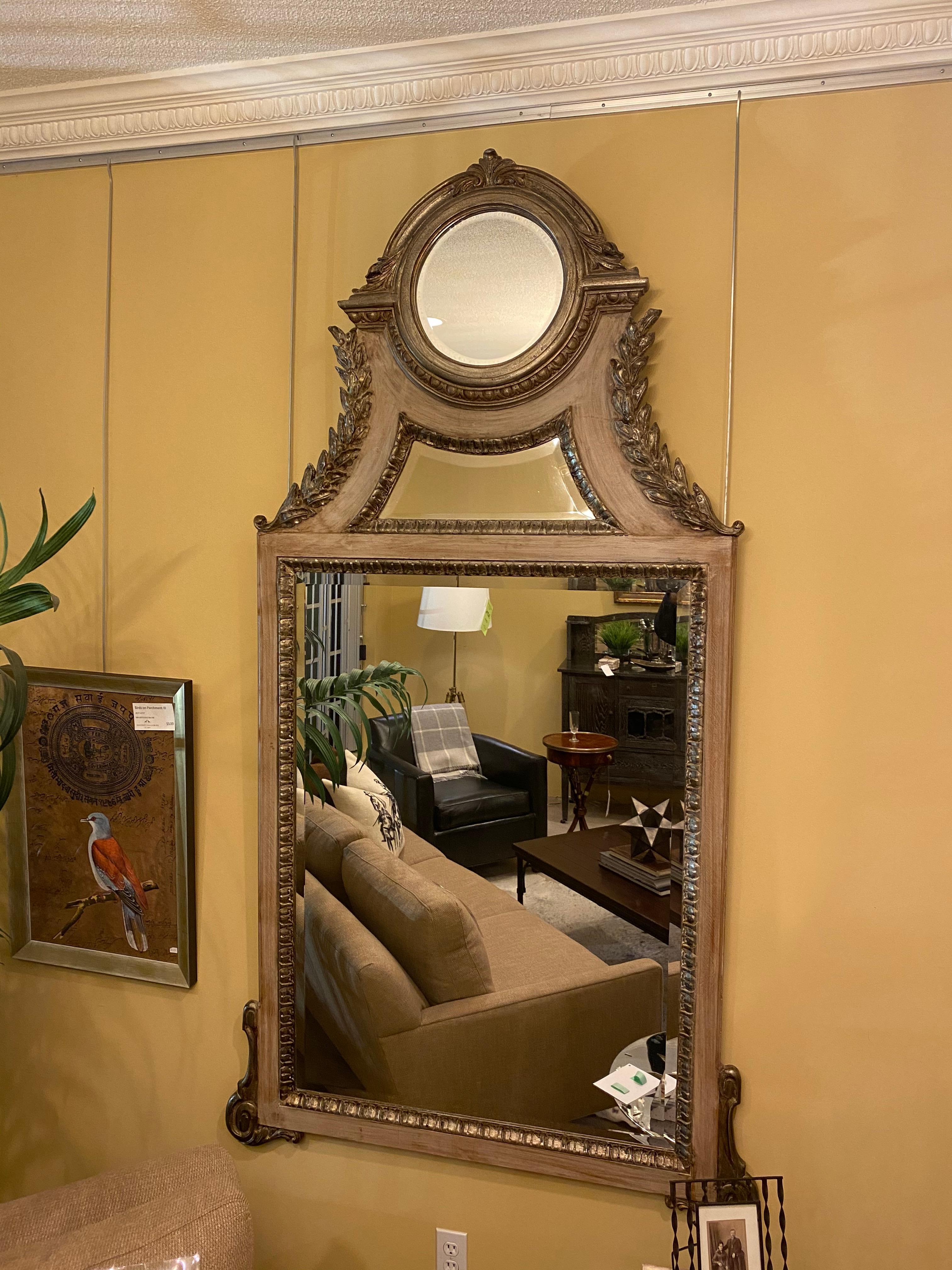 Large architectural mirror with bevel glass.