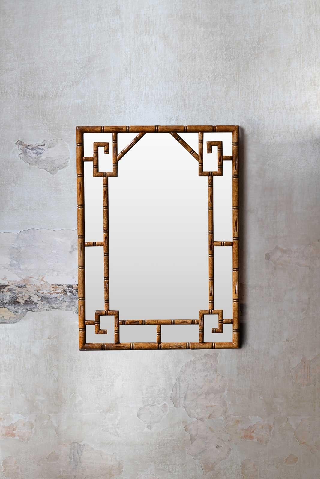 Mirror with geometric patterns in carved bamboo-like wood from the 1920s.
Product details
Dimensions: 66 W x 93 H x 3 D cm