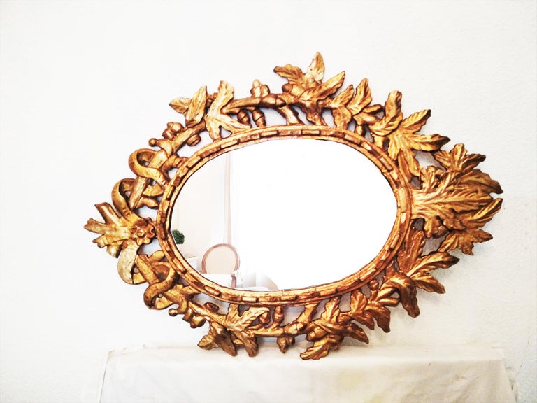 Mirror With  Giltwood Gold Leaf, Oval Shape With Leaves Italy Early 20th Century In Good Condition For Sale In Mombuey, Zamora