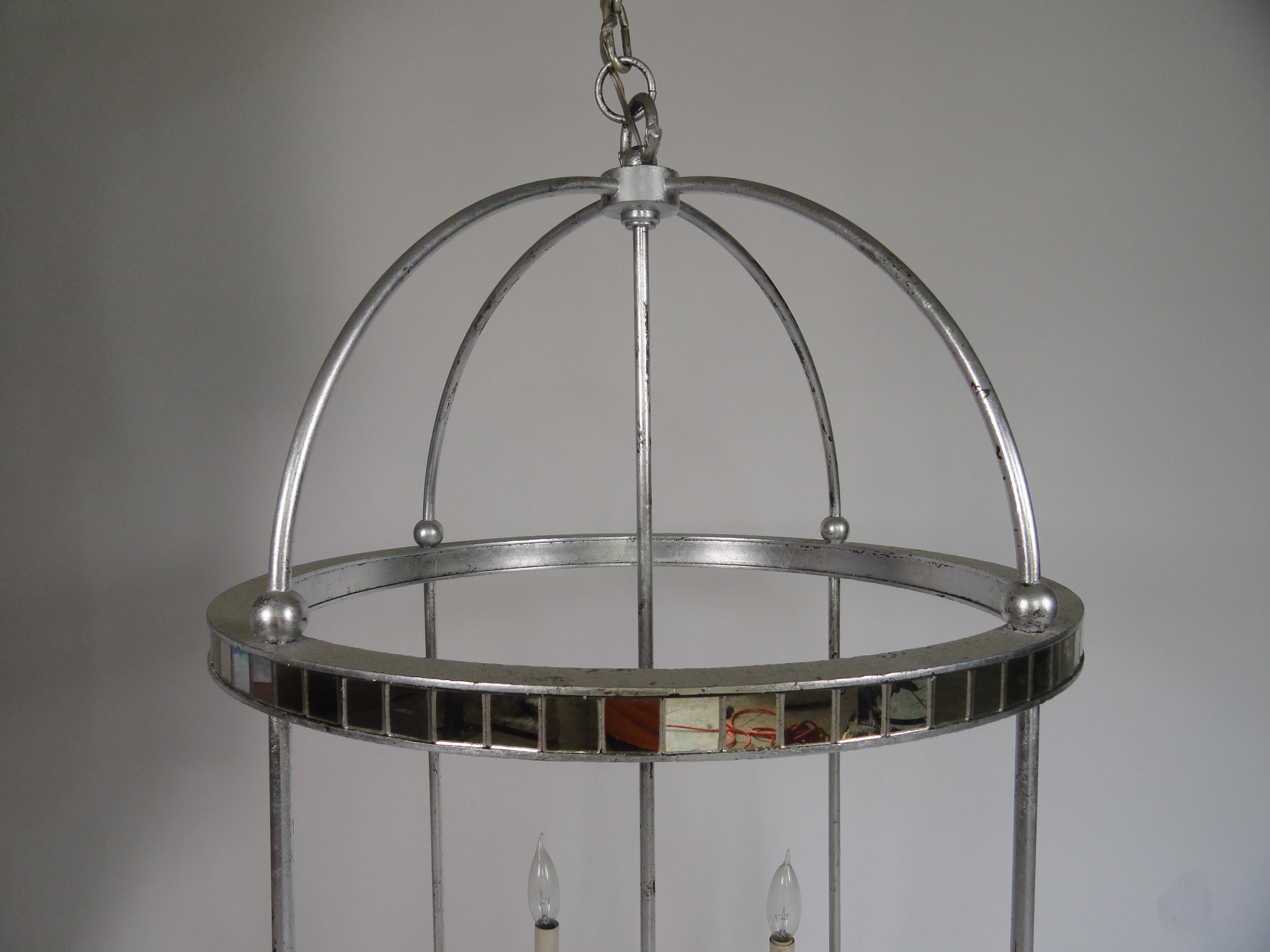 Late 20th century metal and mirrored four-light chandelier in silver-leaf finish.
Measure: 46