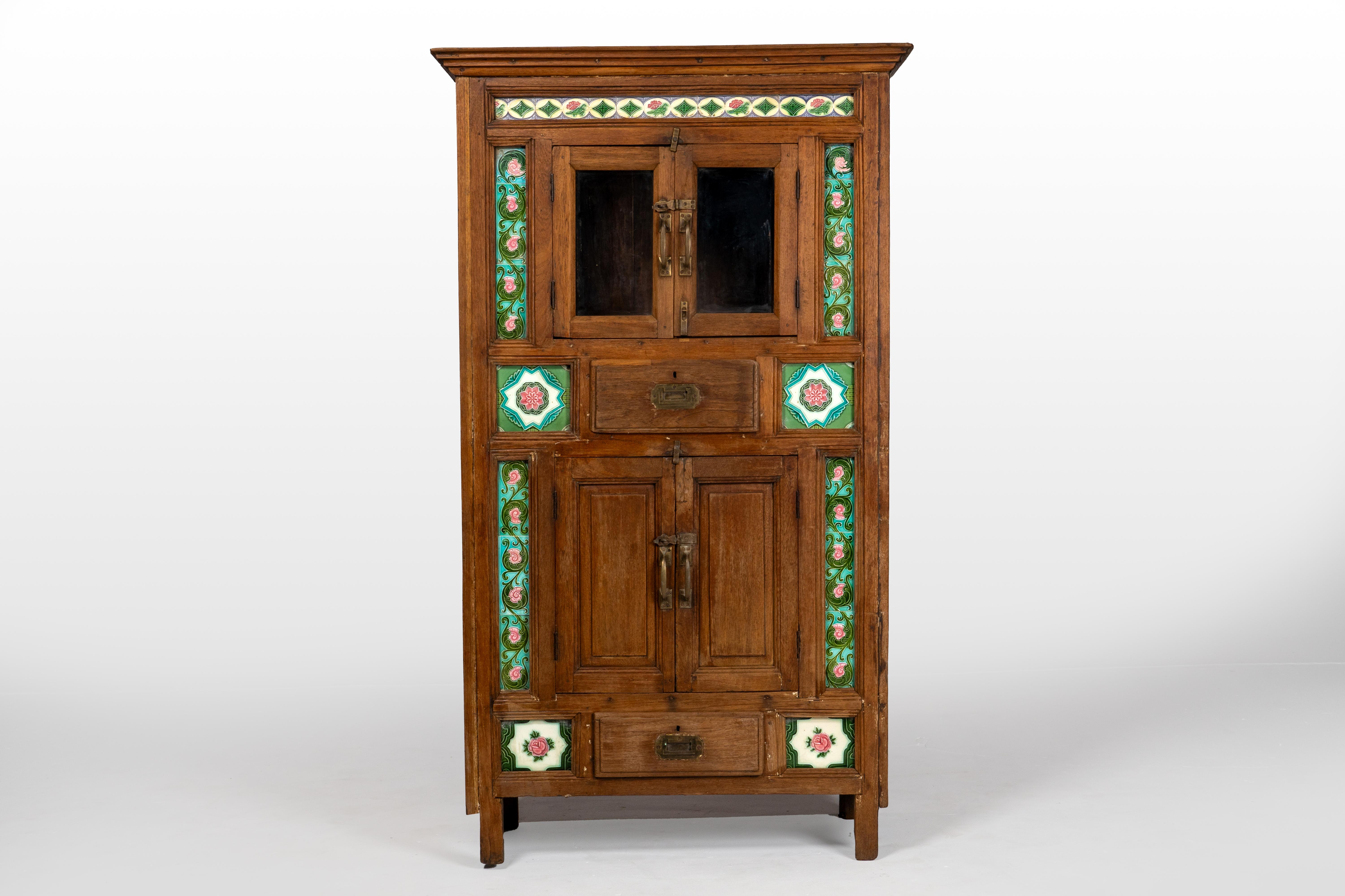 This cabinet is primarily constructed from high-quality teak wood, known for its strength, durability, and rich, warm hue. Teak’s natural oils protect it from moisture and insects, making it ideal for furniture. Reflecting British colonial style,