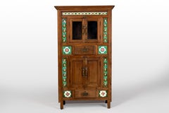 A British Colonial Cabinet with Green Decorative Floral Tiles