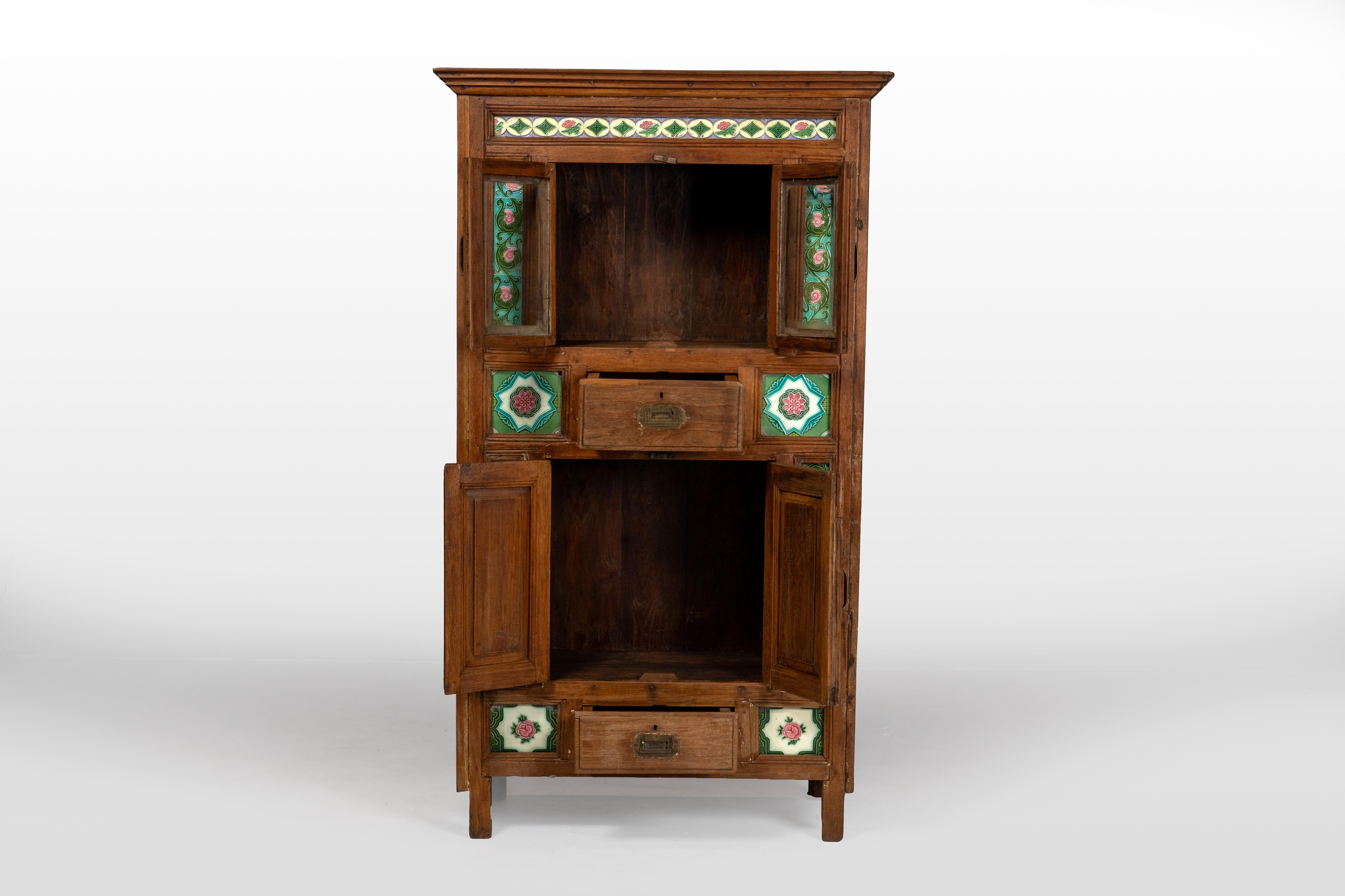 Indian A British Colonial Cabinet with Green Decorative Floral Tiles