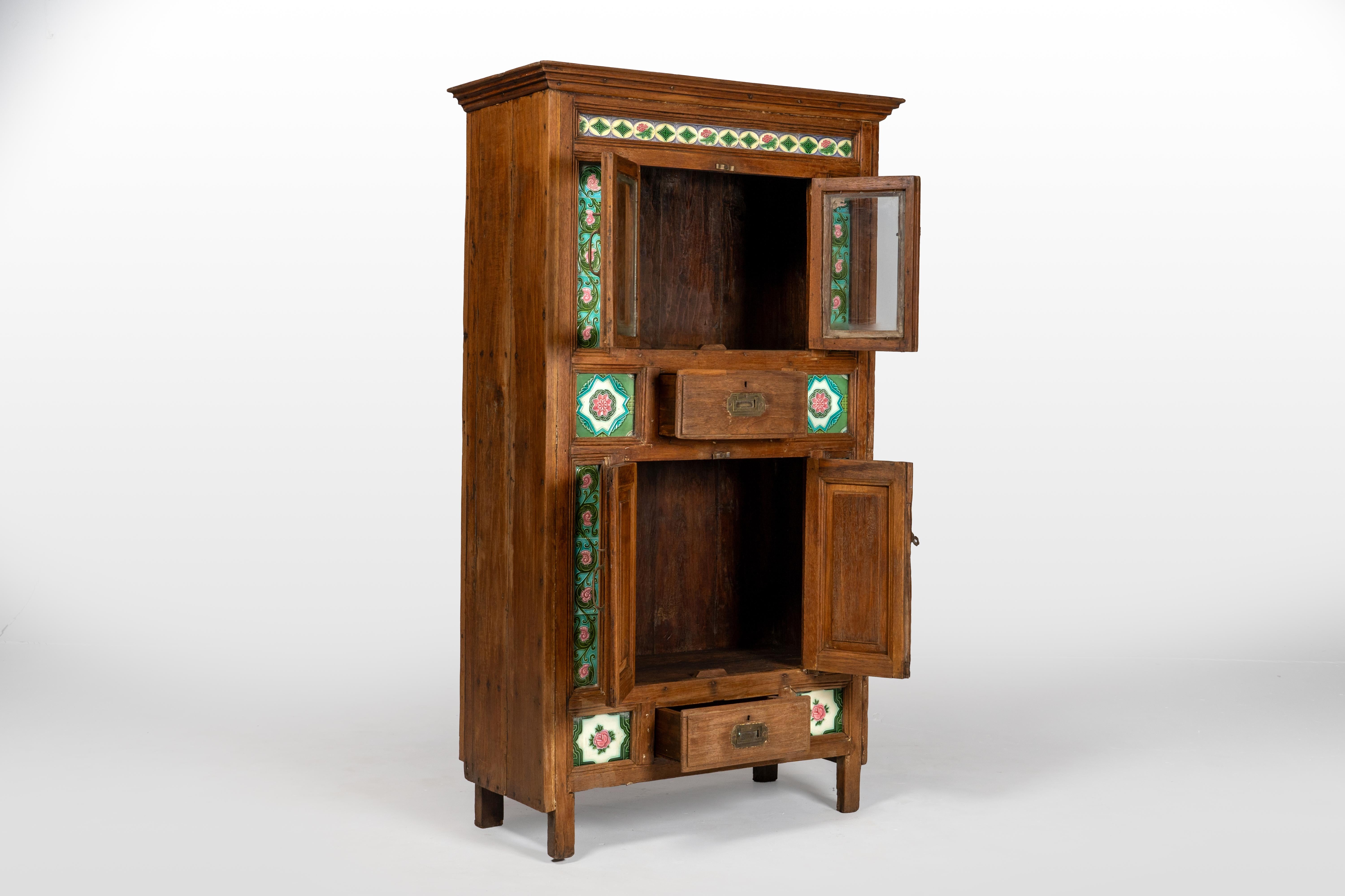 A British Colonial Cabinet with Green Decorative Floral Tiles 1