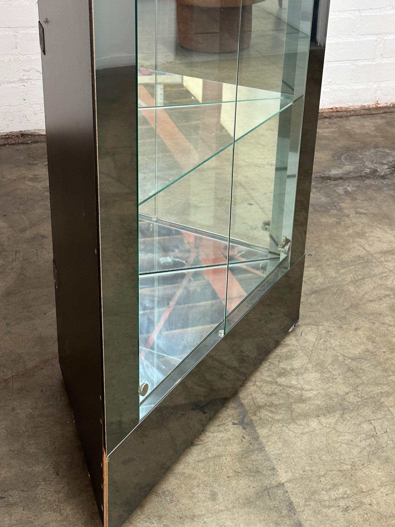 Glass Mirrored chrome and glass corner cabinet For Sale
