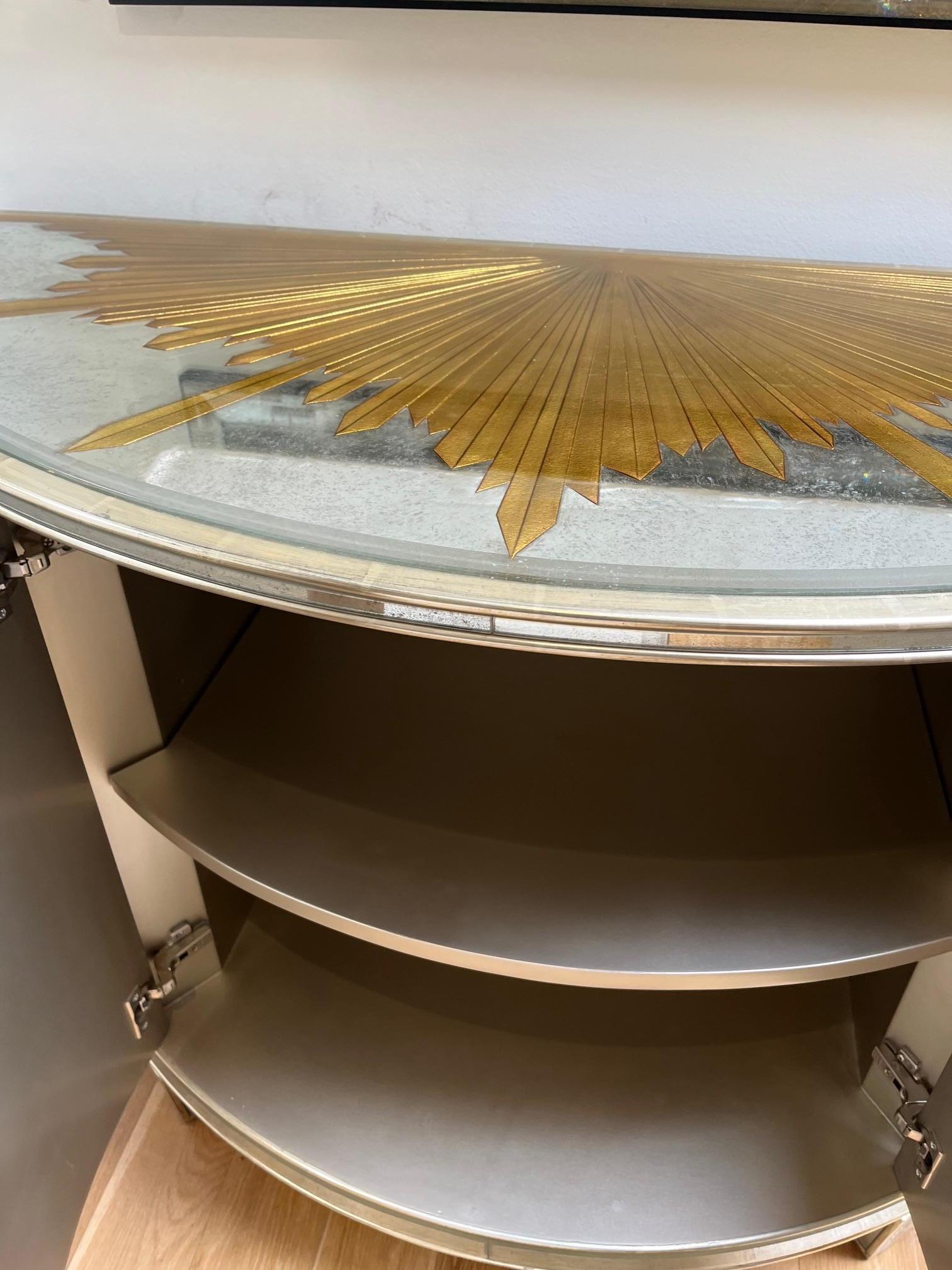 Carved Mirrored Demi Lune Console with Starburst Gilded and Etched Element For Sale