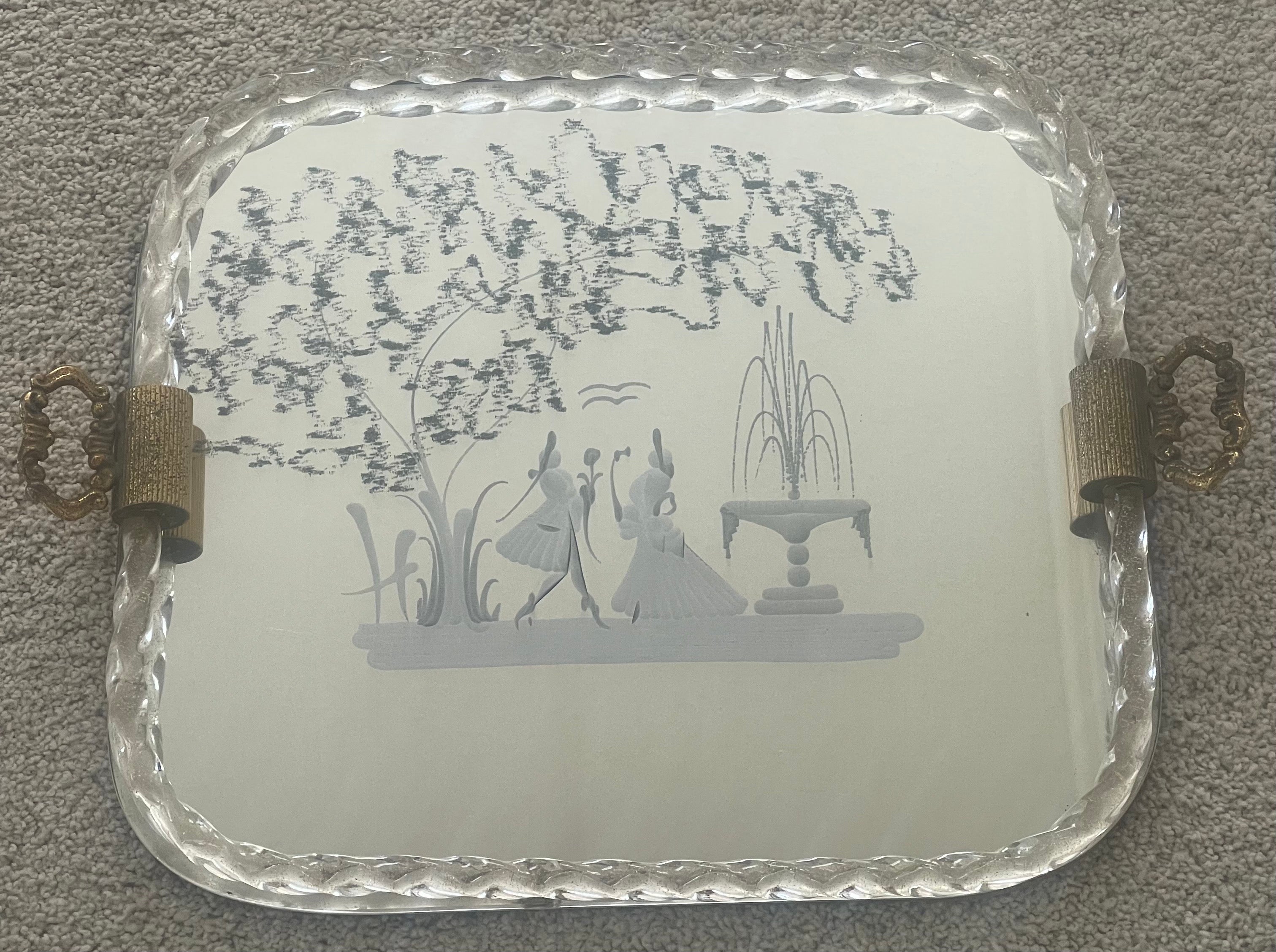 Mirrored engraved glass serving tray by Ercole Barovier for Murano Glass Glassworks of Venice, circa 1940s. This wonderful piece made in Italy and is in very good vintage condition with no chips or cracks (there is some pitting on the handles). The