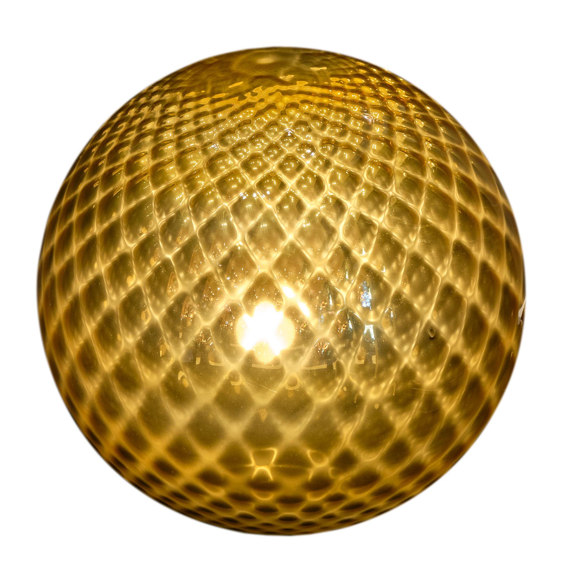 Spheric lamp made with gilt mercury Murano glass blown in the “pagliesco” technique. This piece has been newly wired to fit US standards.