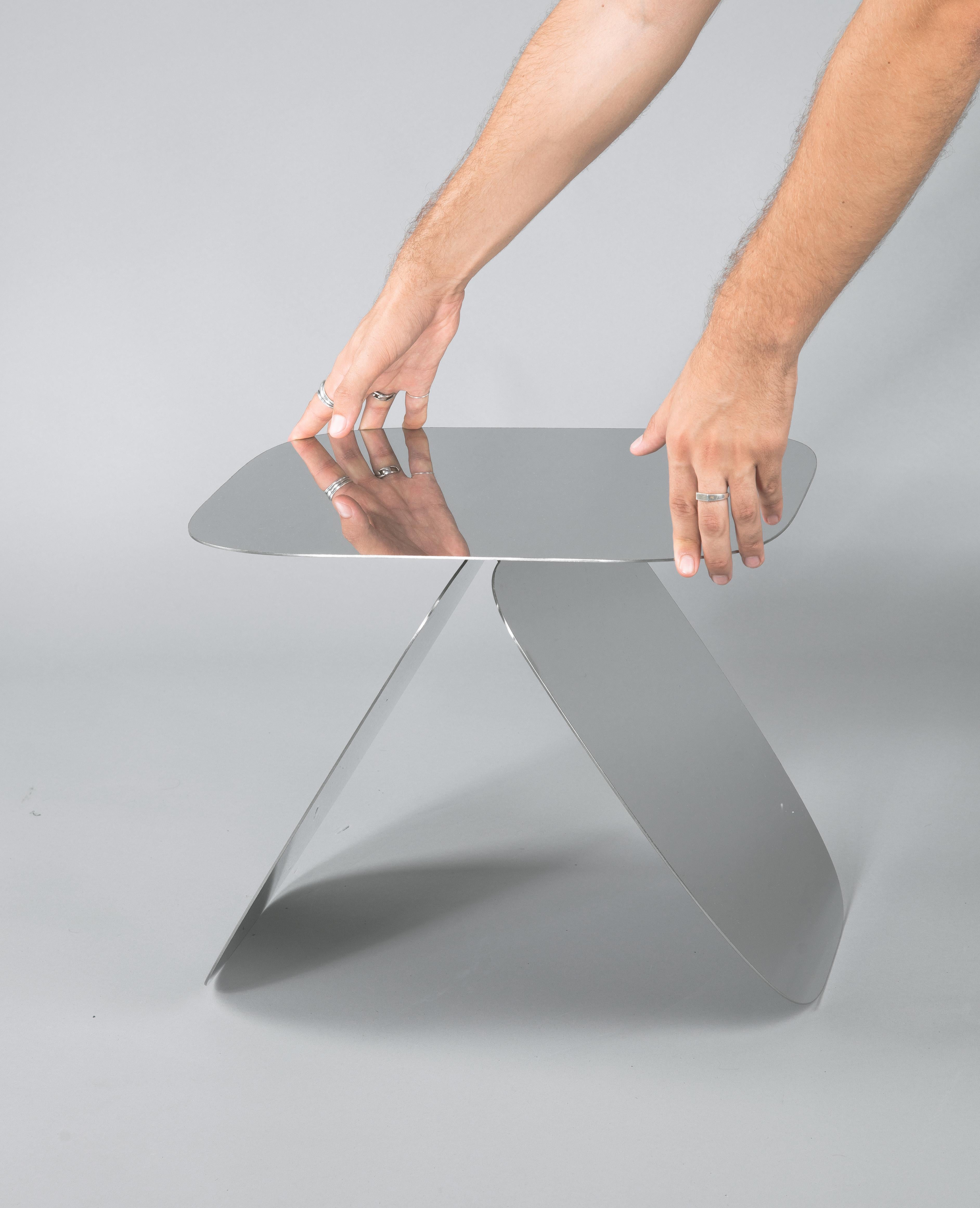 Mirrored Steel Bunny table by Daniel Nikolovski
Dimensions: H 37 x W 43,2 x D 36,3 cm
Materials: Mirrored steel
Also available in powder-coated metal.

‘Bunny Tables’ are side tables made from a cut-out steel sheets resembling bunny ears. The