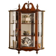 Mirrored wooden hanging wall vitrine with curved glass, 20th century