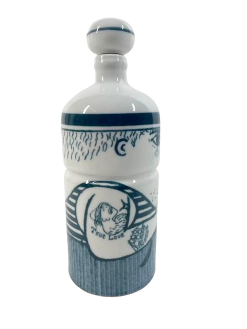 Mid 20th century underglaze decorated blue and white porcelain decanter made in Western Germany. Decorated as a tattooed sailor holding a pipe in one hand, tattooed arms and a flask in his back pocket. 