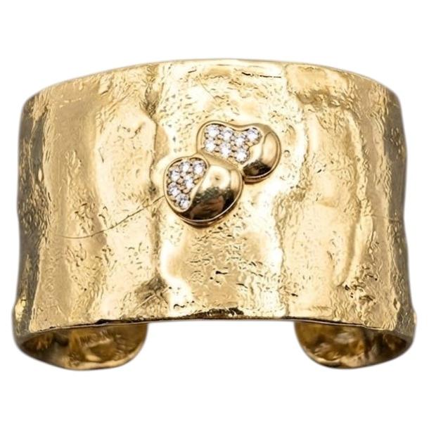 Pulsera tipo brazalete de oro amarillo de 18 quilates con diamantes de Misani en venta