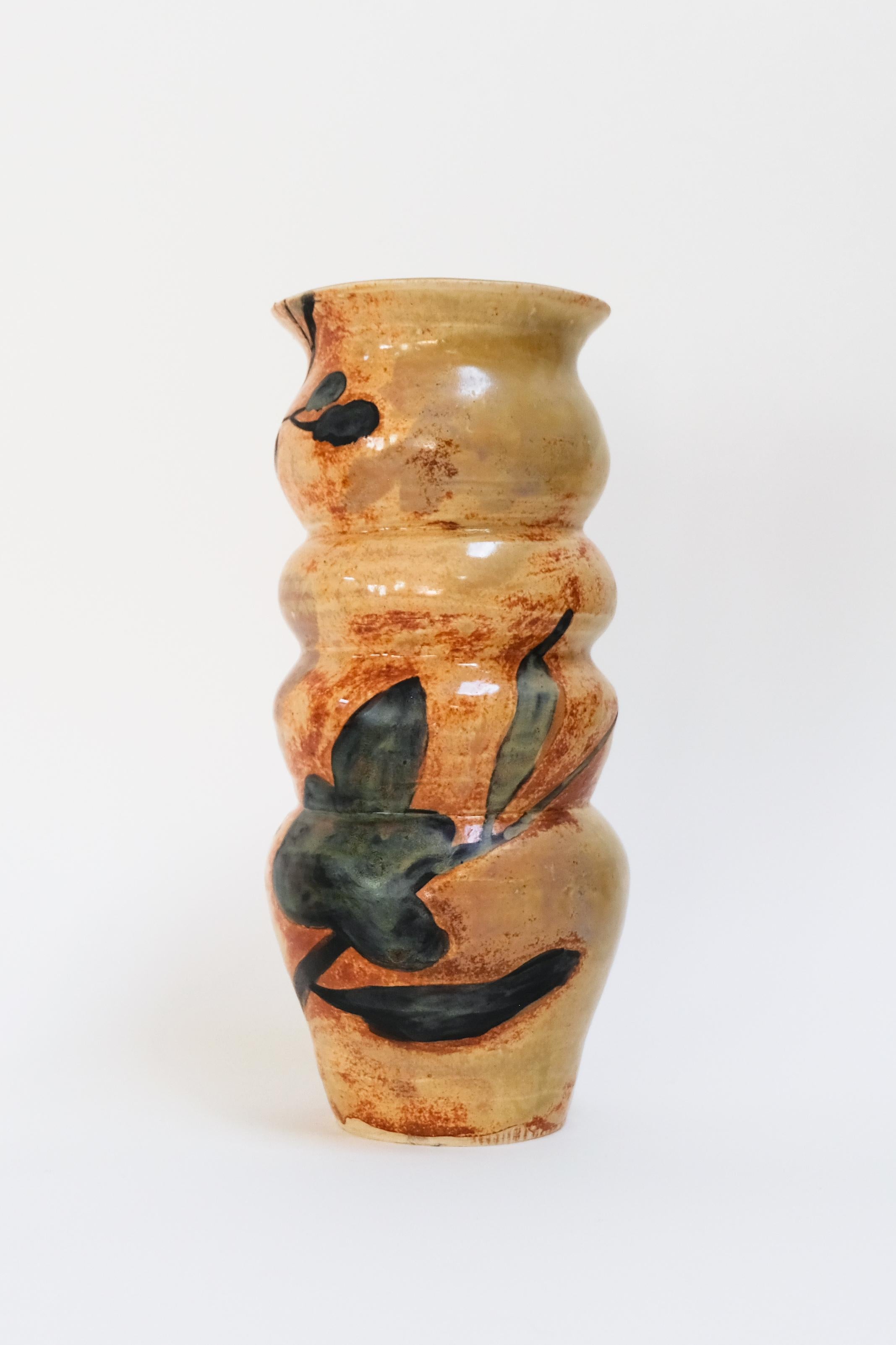 This warm yellow contemporary botanical ceramic vase features a unique berry design and is an original artwork by Canadian artist Misbah Ahmed. This piece from her collection of Mur vessels explores organic feminine forms with clay. Mur - meaning