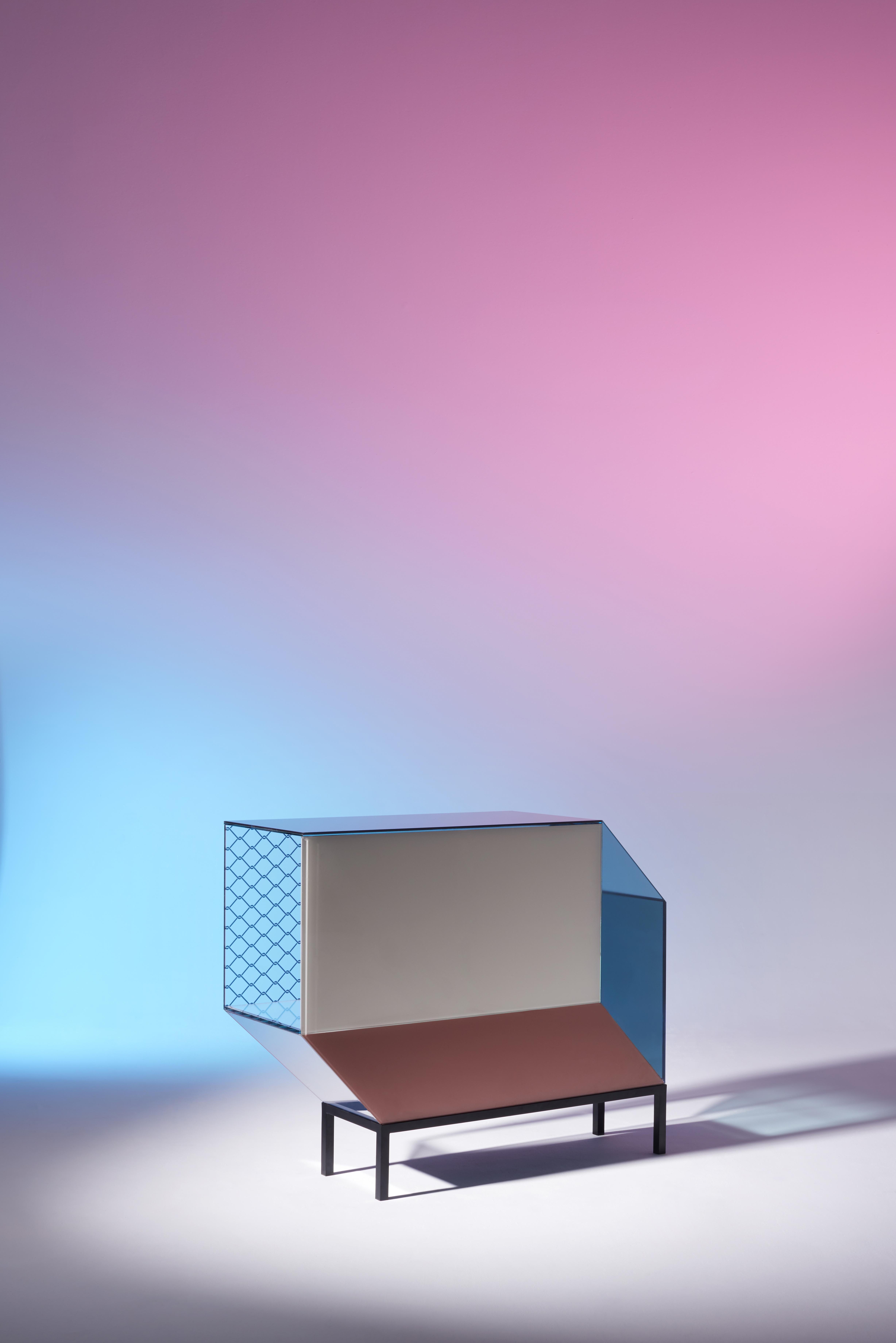 Prototype. Miscredenza is a series of architectural furniture designed by Patricia Urquiola enhanced by colored glass printed with Federico Pepe's patterns.
The collection comprises a sideboard, a vertical bookcase and a horizontal