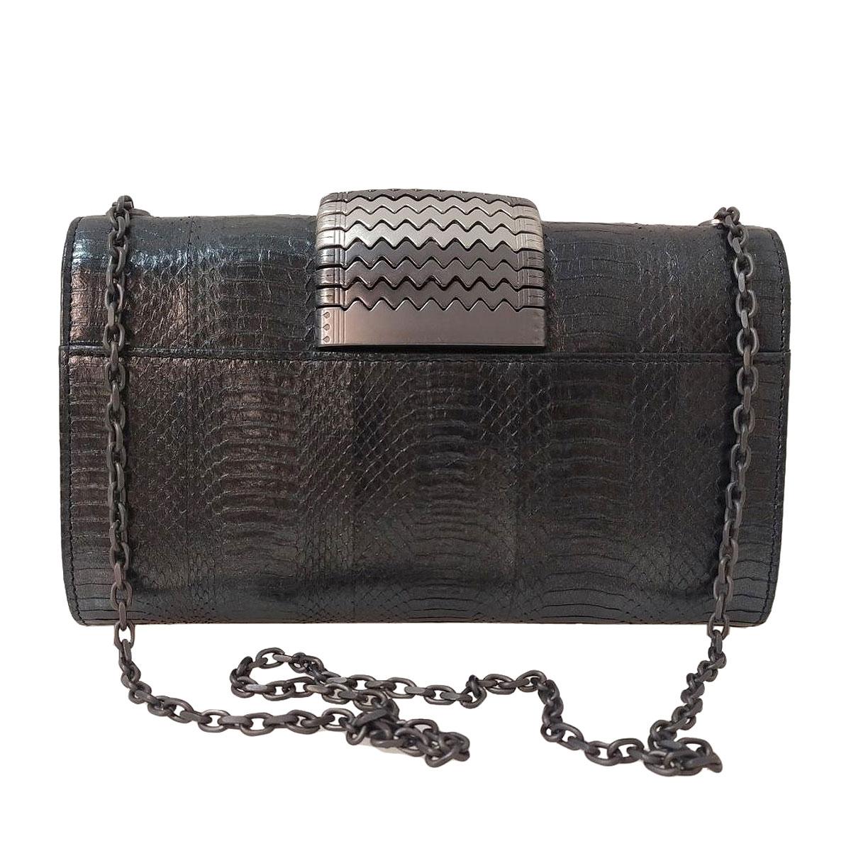 Beautiful Misela bag
Leather
Reptile print
Anthracite color
Central metal element
Metal chain
Magnetic closure
Suede internal
Internal pocket 
Cm 24 x 14 x 6 (19.44 x 5.5 x 2.36 inches)
Original price € 690
Worldwide express shipping included in the