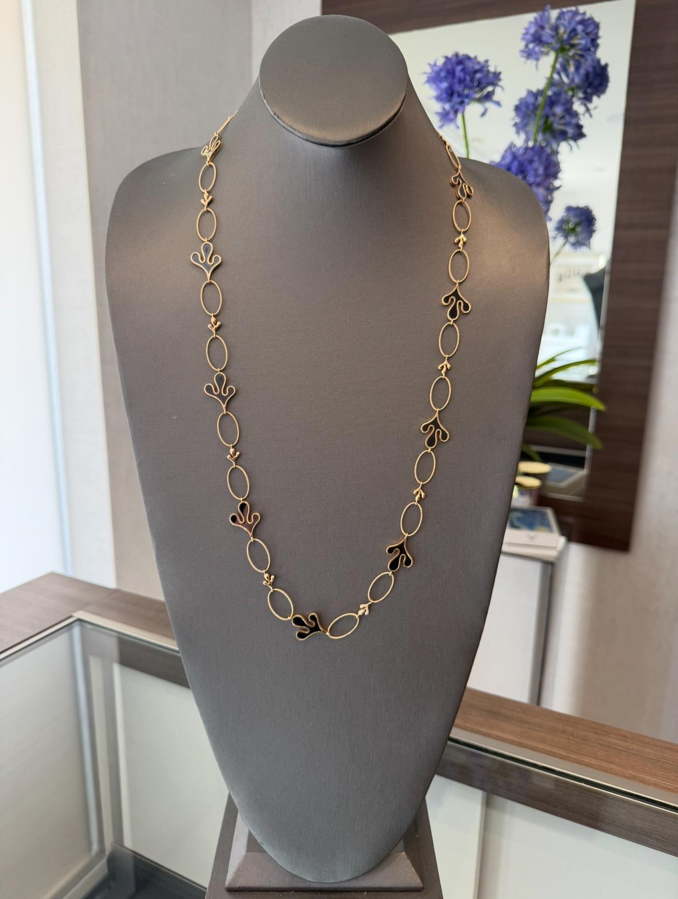 New Miseno Onyx and Diamond Necklace in 18K Rose Gold. The necklace features 10.80ctw of onyx and 0.27ctw of brilliant round diamonds. Normal retail is $14,600. The necklace is 35 inches in length and weighs 58 grams.