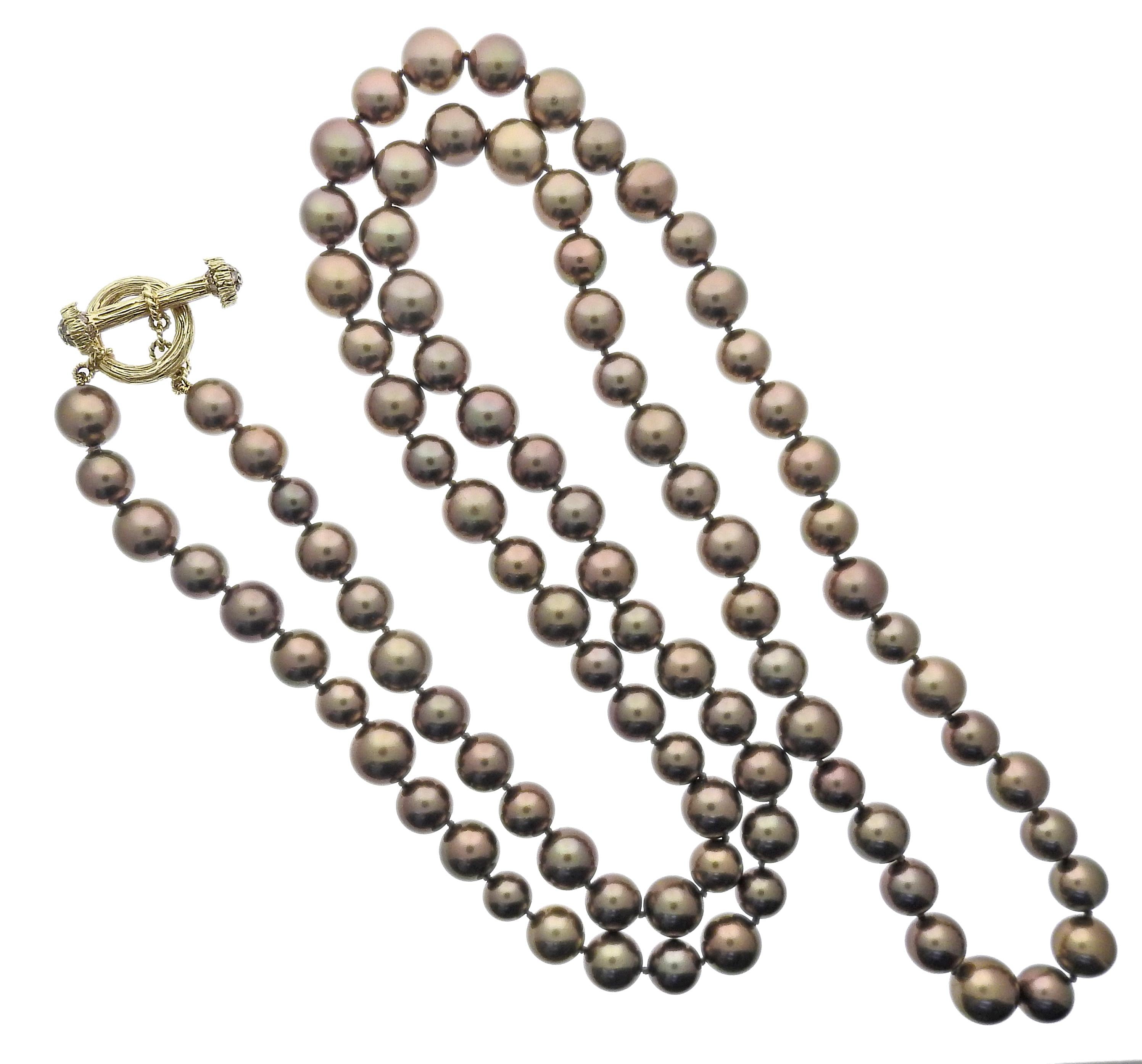18k gold toggle long necklace by Mish New York, with 8.5mm to 10mm chocolate pearls and approx. 0.18ctw fancy diamonds on the clasp. Necklace is 38