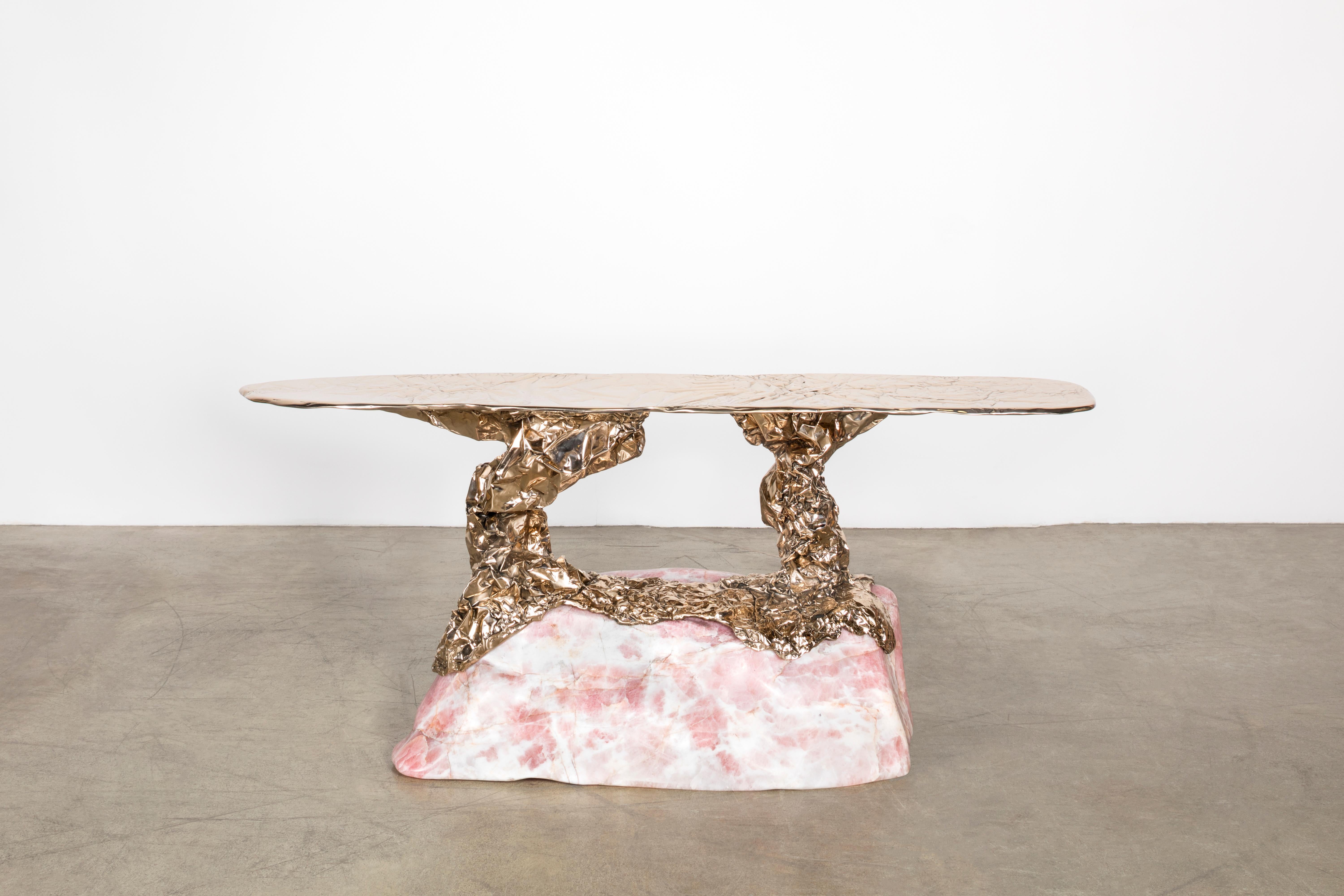 Misha Kahn [American, b. 1989]
Radiant Affection, 2022
Rose quartz, bronze
Measures: 28 x 65.75 x 18.25 inches
71 x 167 x 46 cm
Unique

Since 2017 Misha Kahn has produced tables, chairs, and consoles from his Rock series. Each function is