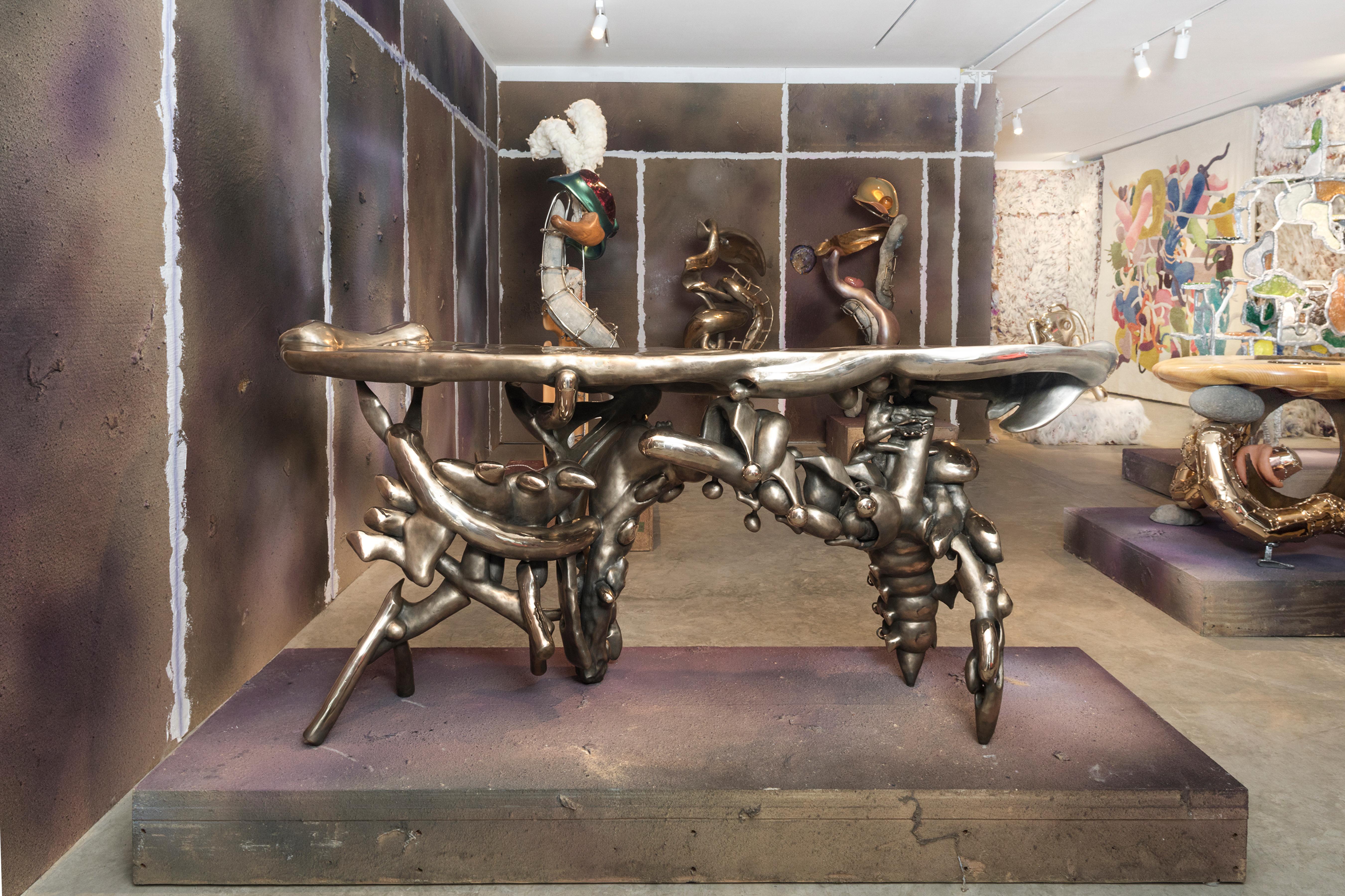 Misha Kahn [American, b. 1989]
Reception desk for the Unknown, 2020
Bronze
Measures: 37.5 x 83 x 25.5 inches
95.3 x 210.8 x 64.8 cm
This work is unique

Misha Kahn was born in Duluth, Minnesota in 1989. He graduated from the Rhode Island
