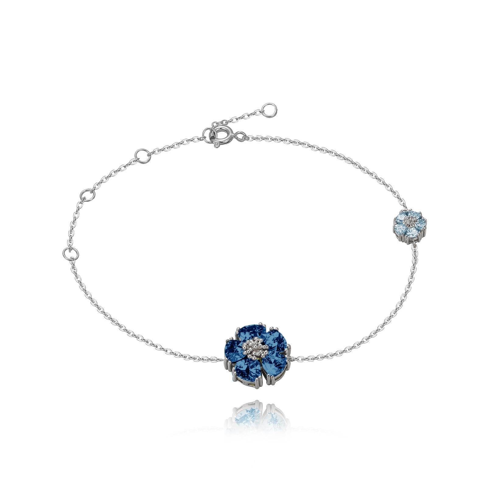 Whatever the season, take a little natural beauty with you everywhere you go. This elegant, light-weight on-trend mismatched blossom anklet is a statement piece for whatever your ensemble . .925 sterling silver base. Also available in 24k yellow or