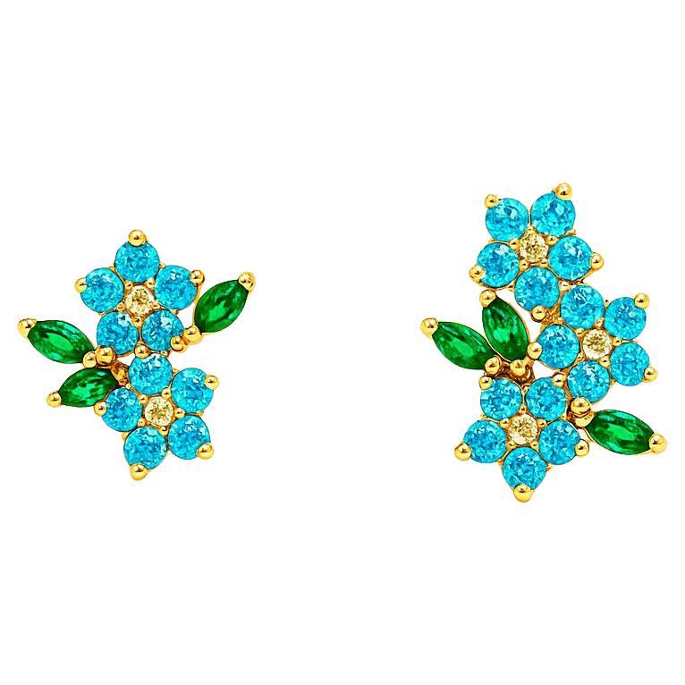 Orecchini a fiore con gemme colorate in oro 14k.