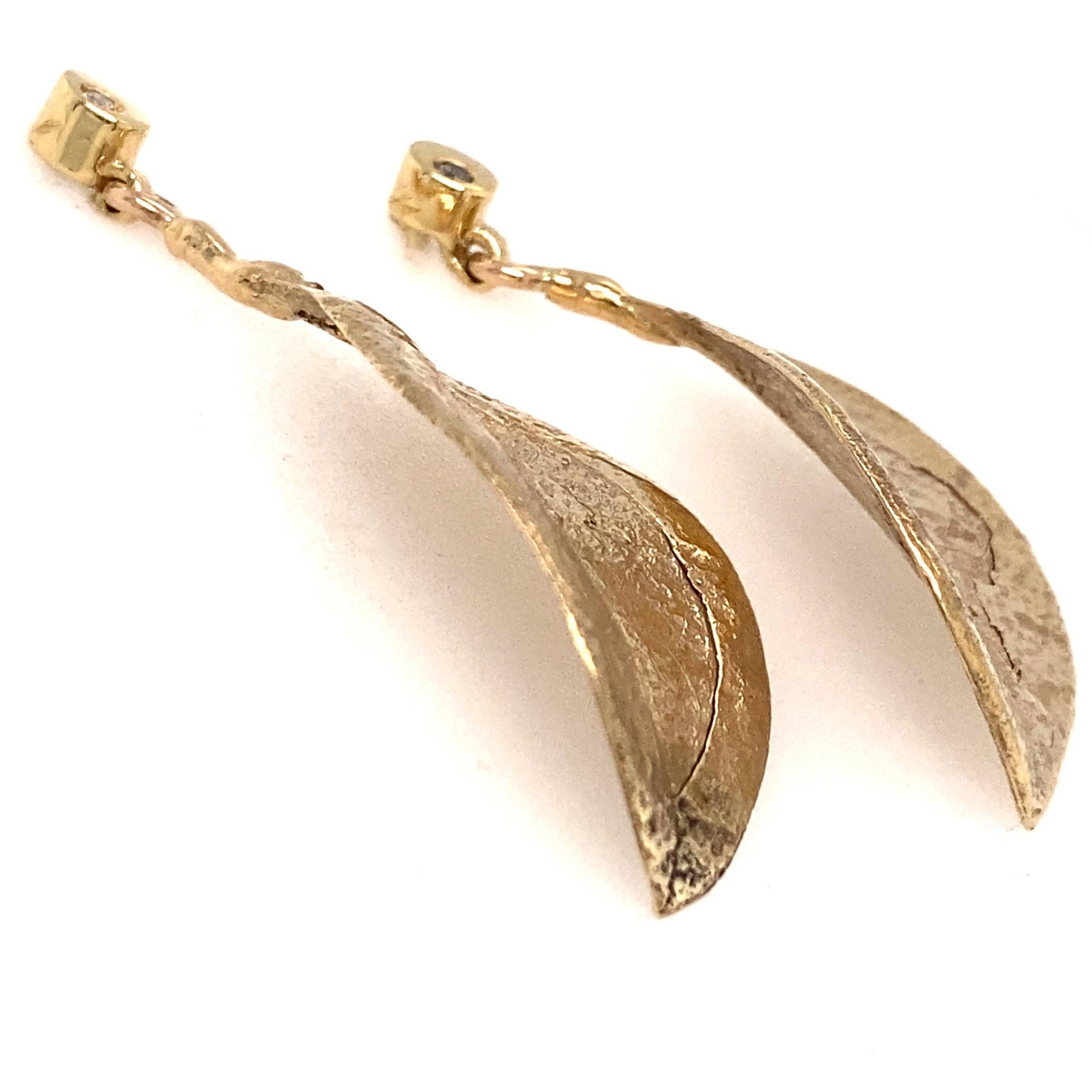 Brilliant Cut Mismatched Leaf Dangle Earrings in Yellow Gold with Diamond Accents For Sale
