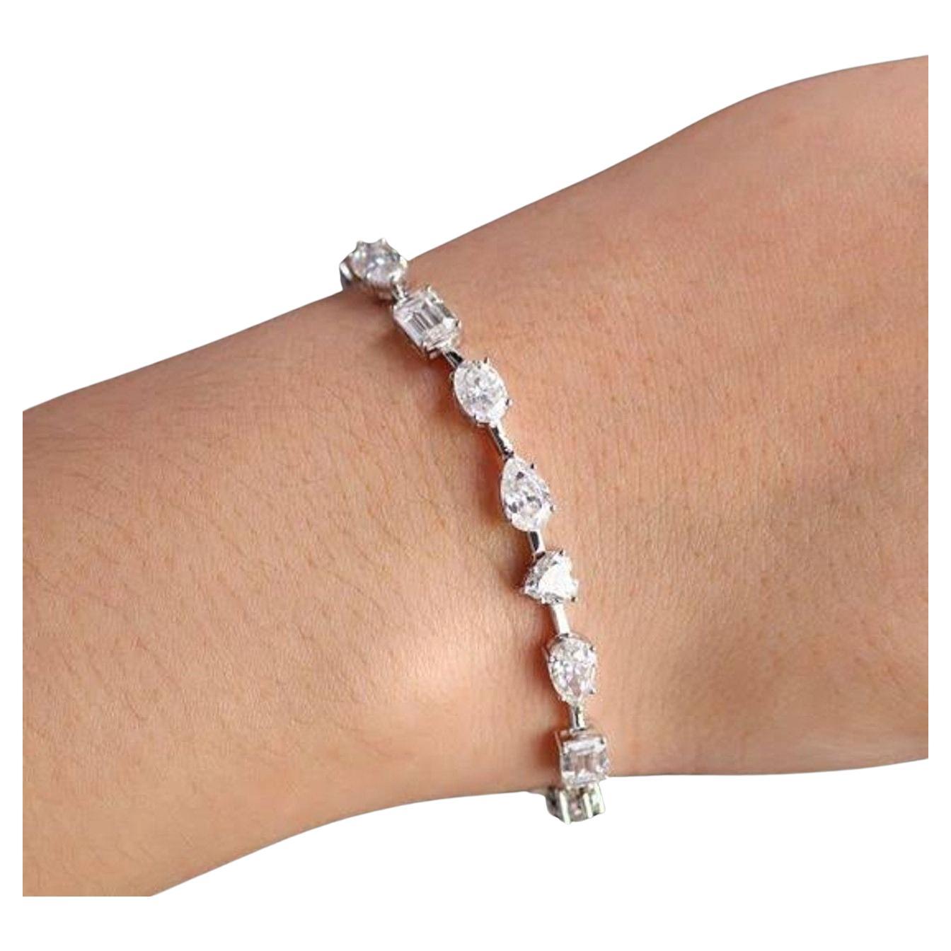 Mismatched Mixed Fancy Cut Diamond Bracelet

Discover the artistry of individuality with our Mismatch Mixed Fancy Cut Diamond Bracelet. This exceptional piece is a celebration of diversity, featuring various fancy cut diamonds set in a distinctive,