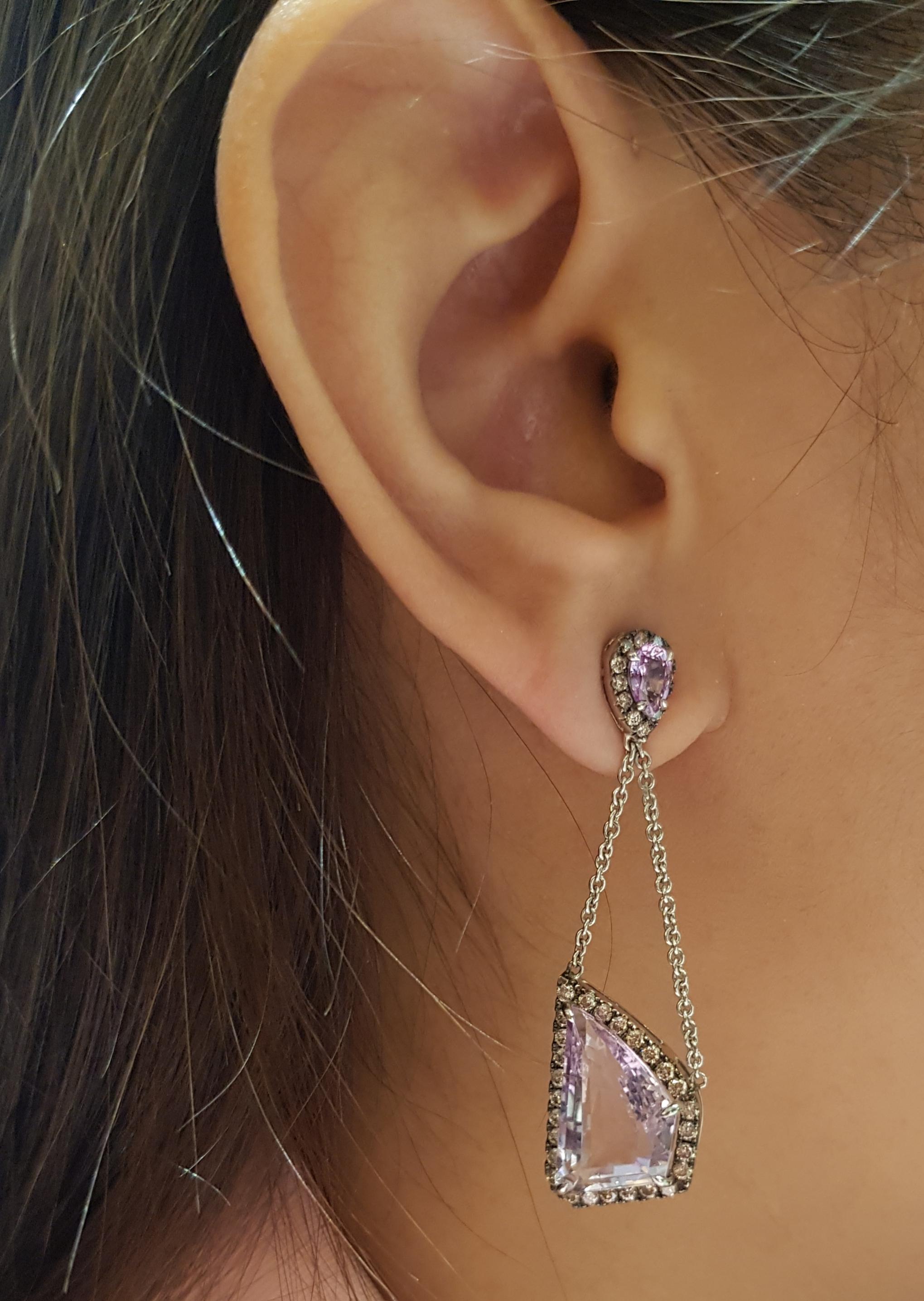 Amethyst 15.47 carats with Pink Sapphire 0.98 carat and Brown Diamond 1.11 cts Earrings set in 18 Karat White Gold Settings

Width:  1.8 cm 
Length:  4.9 cm
Total Weight: 14.0 grams

