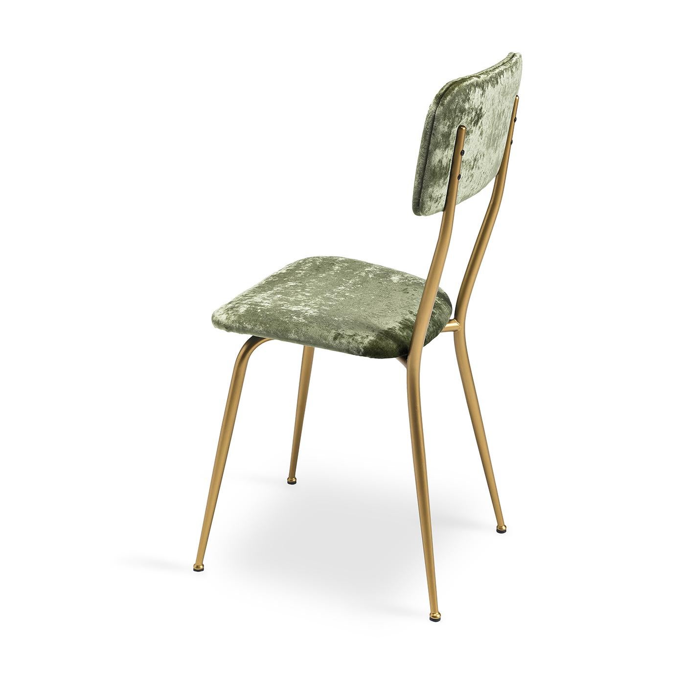 Transform your living space with the sleek lines and effortless beauty of the Miss Ava 8 Chair. Its padded seat and backrest are upholstered in luxurious mint velvet fabric, whilst its clean metal frame showcases a brushed brass finish. A harmonious