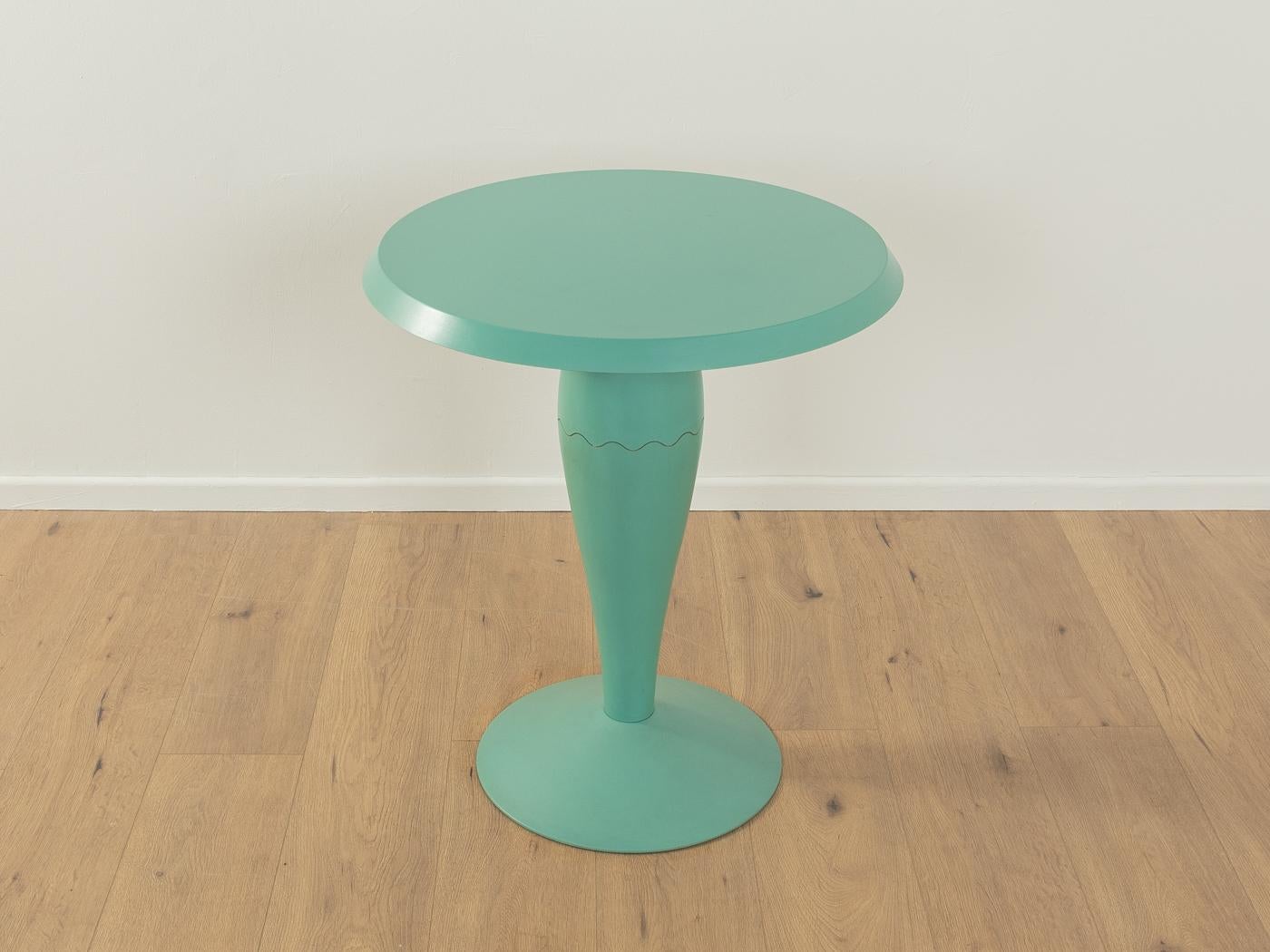 MISS BALŪ bistro table by Philippe Starck for Kartell from the 1980s. High-quality frame and table top made of dyed-through polypropylene in jade green.

Quality Features:

very good workmanship
high-quality materials
Made in Italy. Design: Philippe