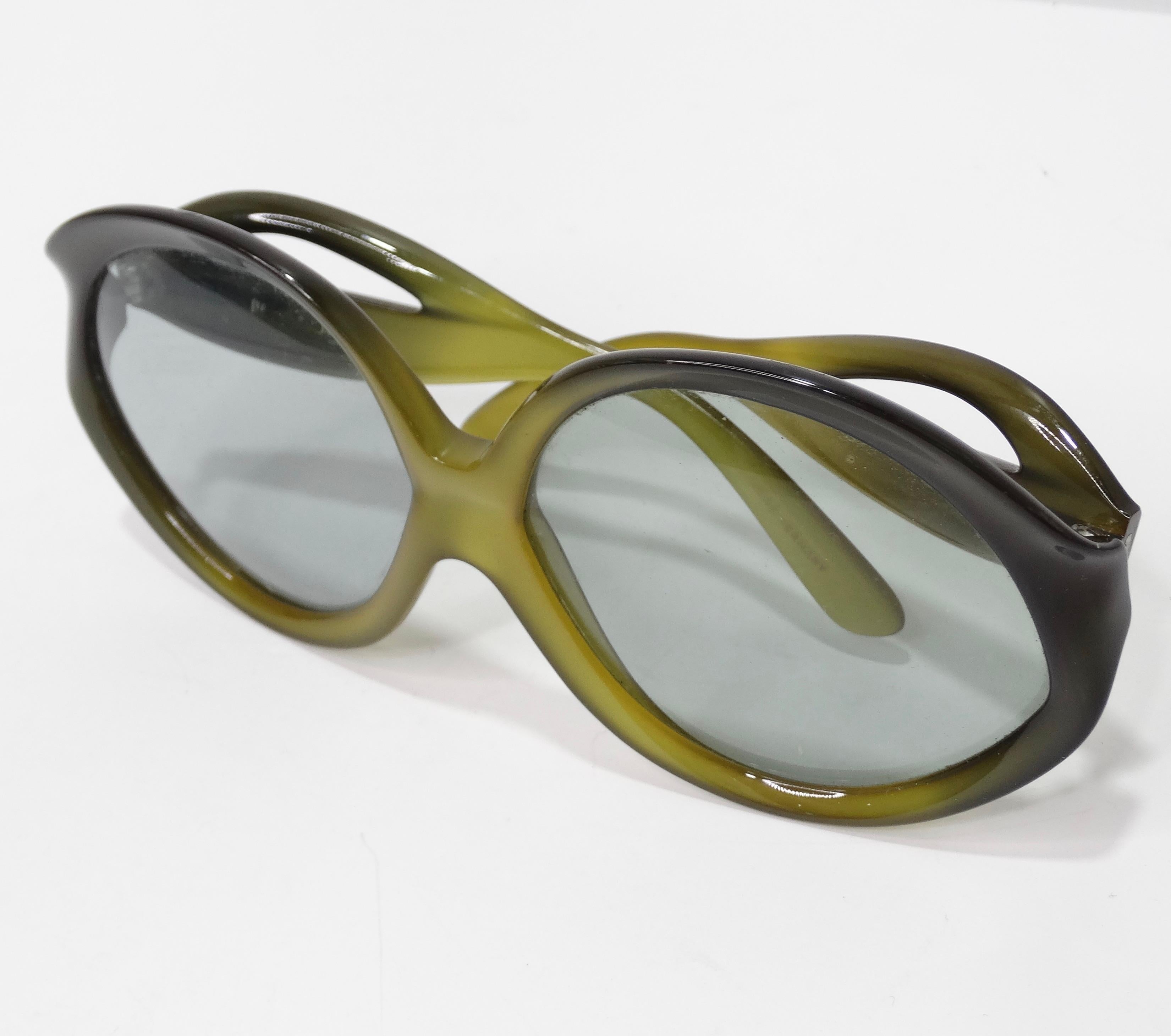 These statement sunglasses are a must have for all your summer looks! Gorgeous, Miss Dior green and black gradient sunnies. Perfect for anyone nostalgic for the 60's that loves a round frame. Pair with a Missoni beach cover-up and Chanel tote bag to