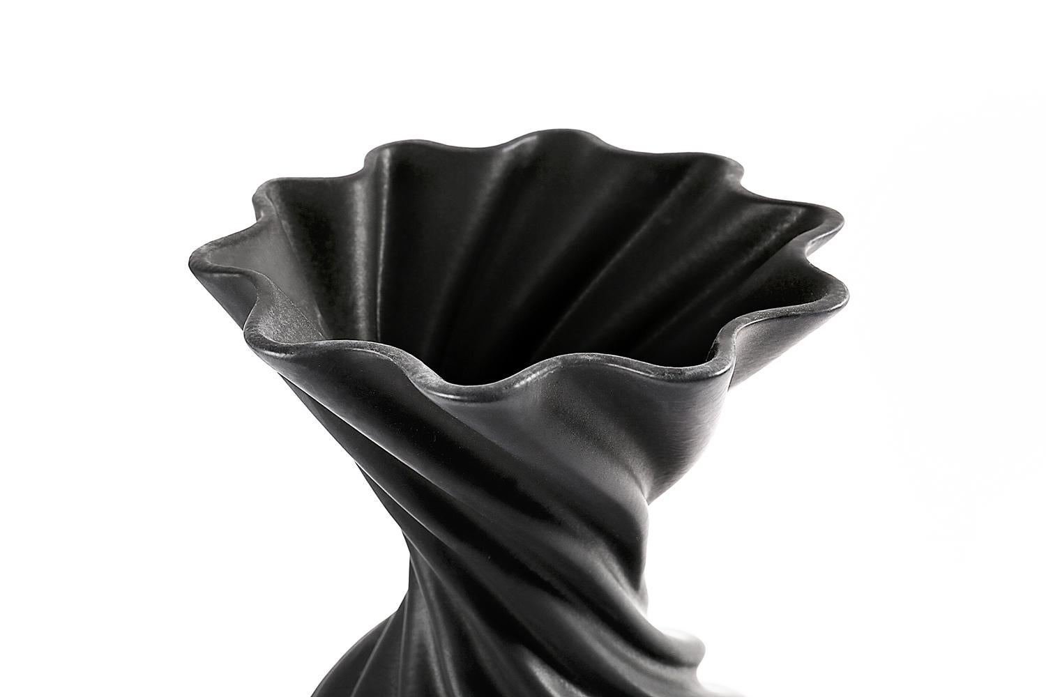 Miss Jolie is a decorative ceramic vase that pauses movement; like a cloth, its folds reveal an ironic static dynamism. Designed by Joel Escalona as part of his Personal Edition collection.

Joel, one of the most prolific and multidisciplinary