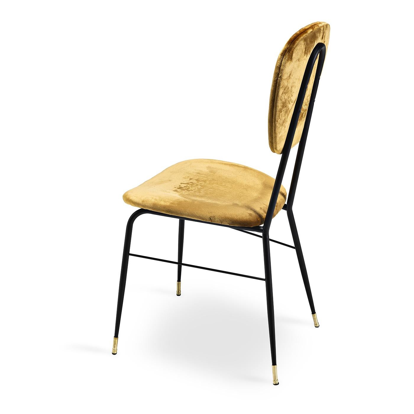 Take a glamorous seat on this vintage-feel dining chair with a high back, and a sleek metal frame painted in a matte black finish. Back and seat are both comfortable and structured thanks to polyurethane and curved wood inserts and are upholstered