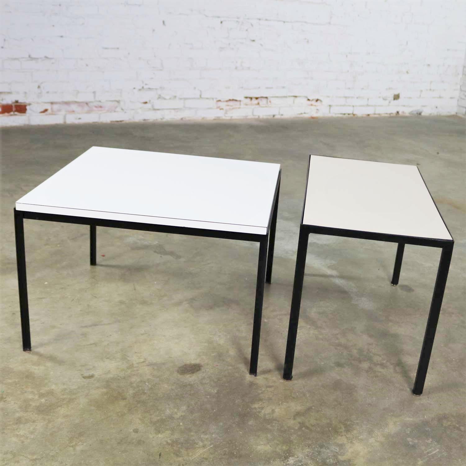 Great Mid-Century Modern black wrought iron side tables with laminate tops. They are miss matched in shape and size, so we have priced them separately. You may buy one or two. They are in wonderful vintage condition with no outstanding flaws we have