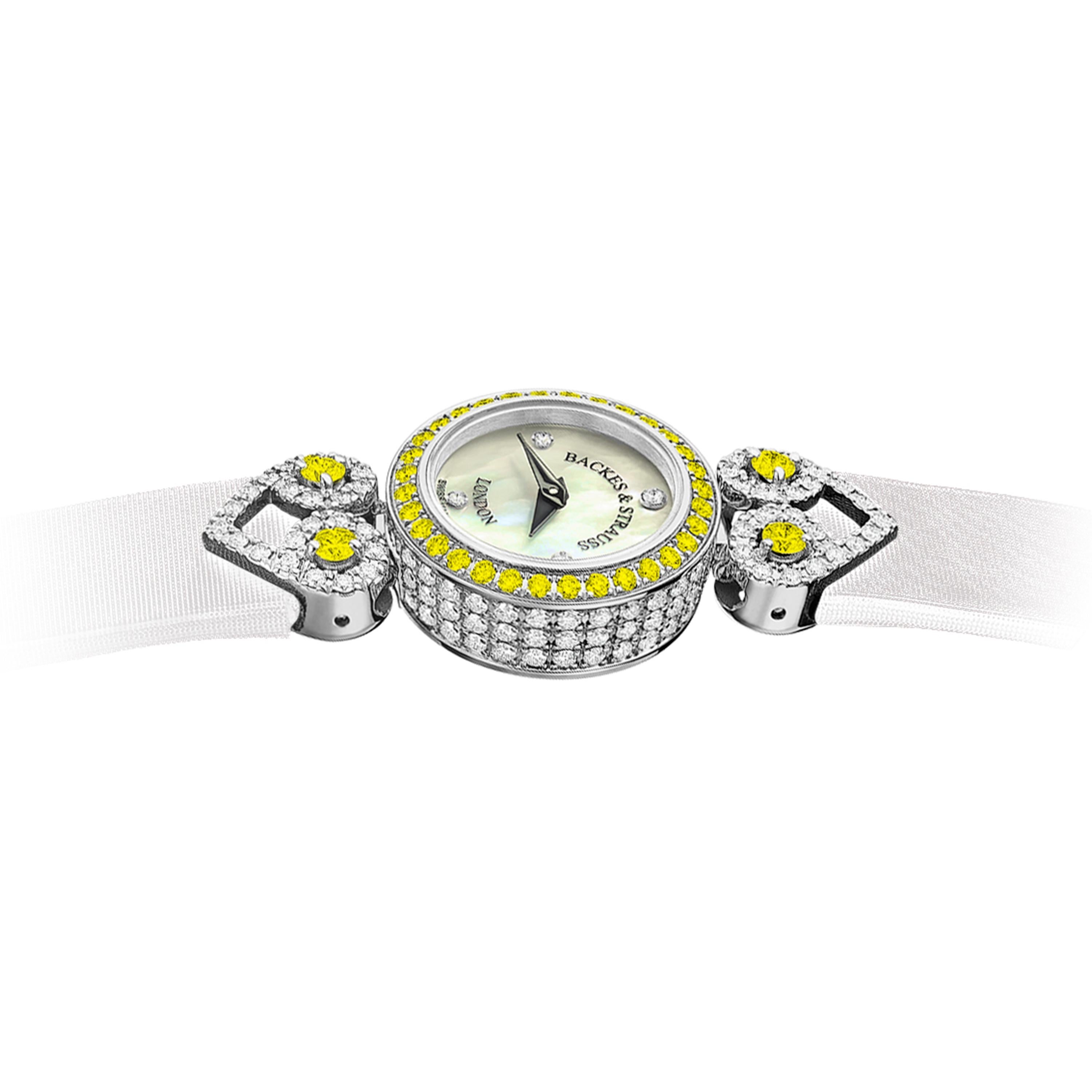 Miss Victoria Fancy Canary is a luxury diamond watch for women crafted in 18kt White gold, featuring the mother-of-pearl dial, quartz movement. The case, dial and buckle are set with white Ideal Cut and fancy yellow diamonds. It is an 18mm classy