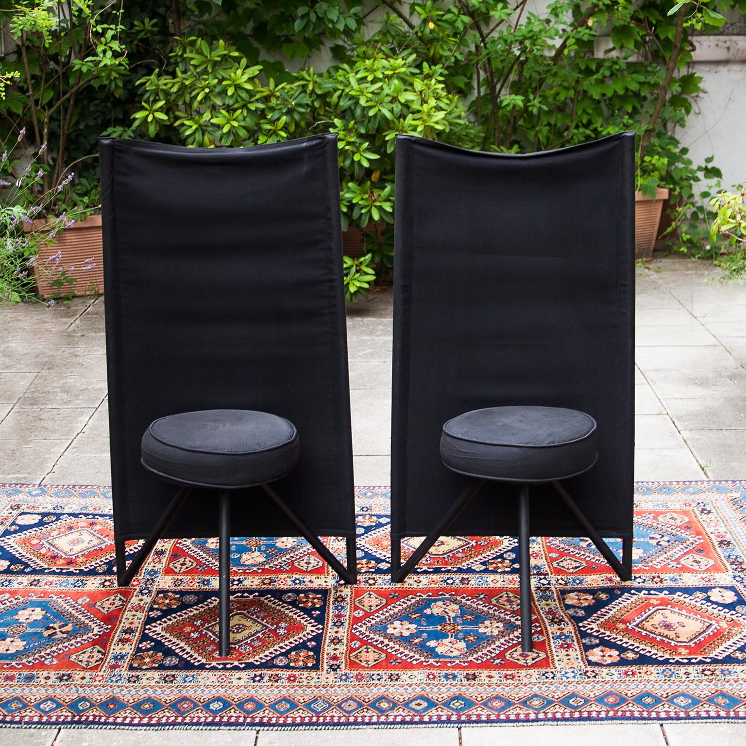 A rare and collectible chair designed by Philippe Starck in 1982 for Disform. Black cotton canvas fabric is stretched over two vertical steel tubes and the tension creates the comfortable back of the chair. The seat has a matching cotton canvas