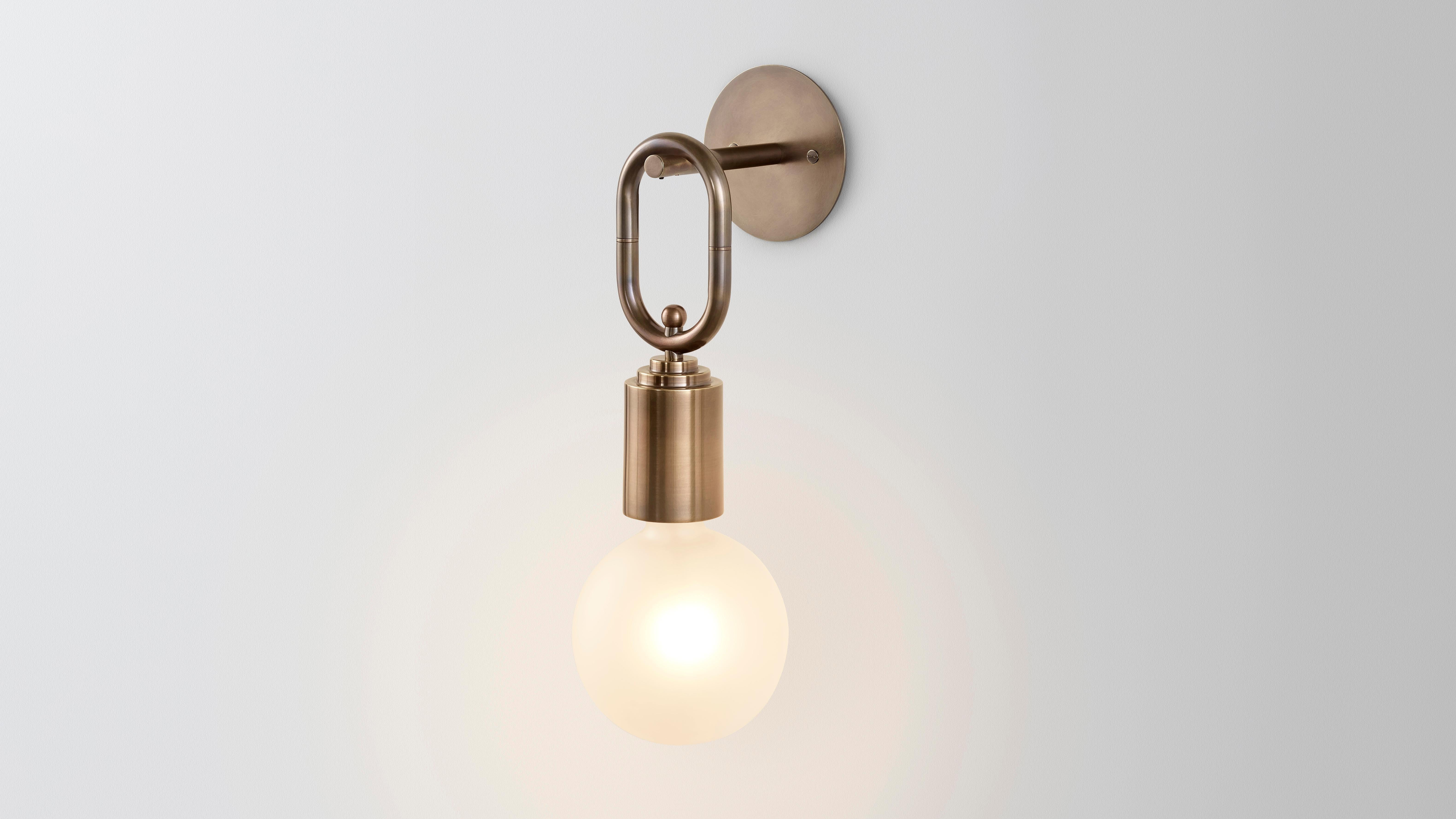 Polished Missing Link Wall Sconce by Volker Haug