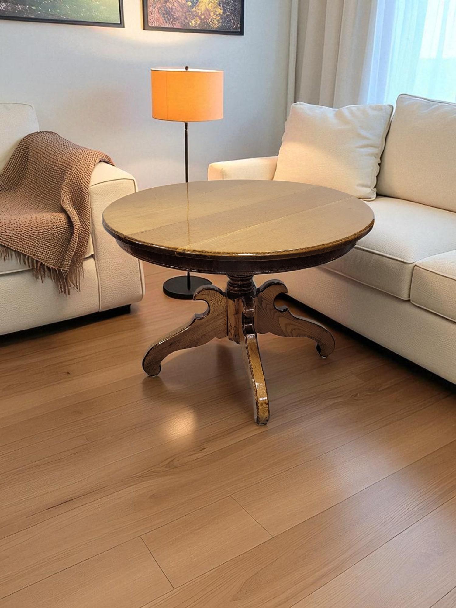 This solid oak pedestal side table reflects the enduring appeal of the Mission and Arts and Crafts styles, popular in the late 19th to early 20th century. With its clean lines, quality craftsmanship, and emphasis on natural materials, it exemplifies