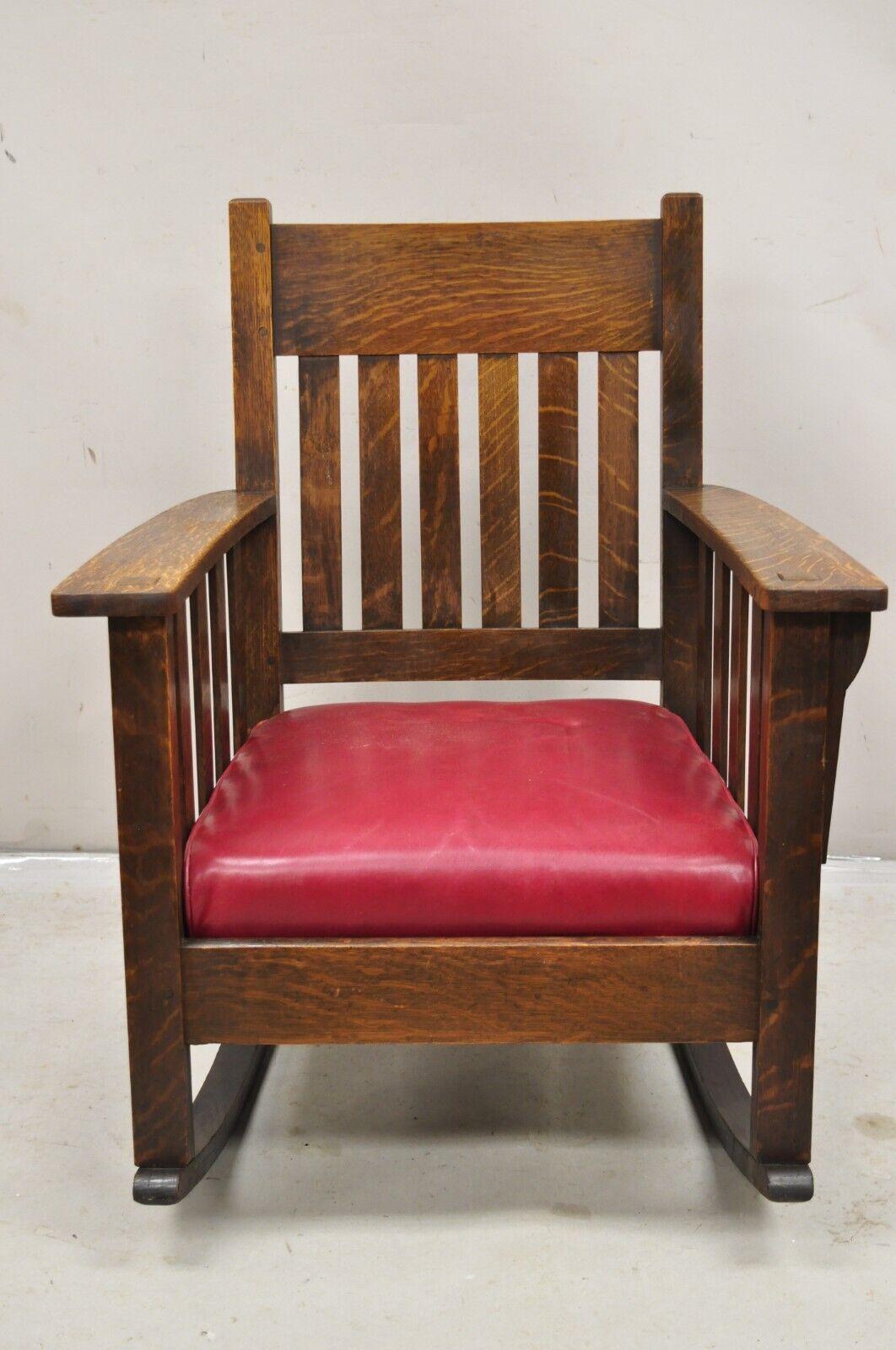 Mission Oak Arts & Crafts Stickley JM Young Style Rocker Rocking Chair Red Seat. Item features mortise and tenon joints, beautiful quartersawn oak wood, original red Naugahyde spring cushion, very nice antique chair. Possibly by Stickley / Quaint