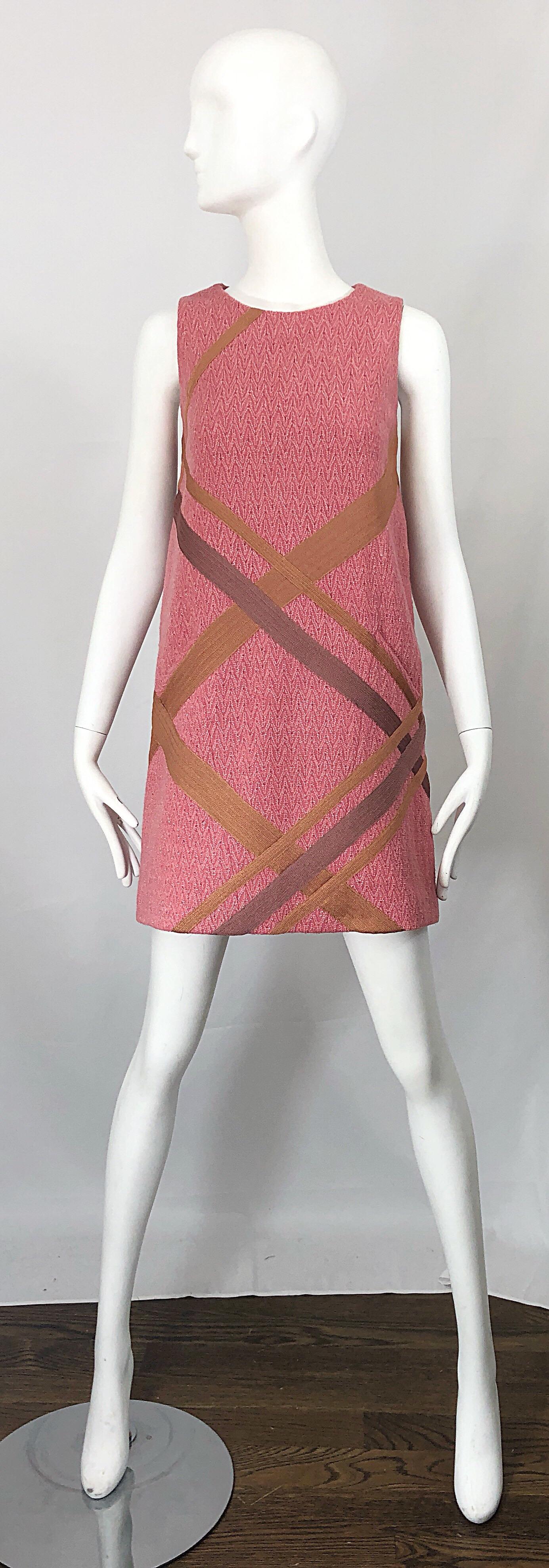 Chic vintage 90s does 60s MISSONI Orange Label mod bubblegum pink and tan shift dress! Features a pink backdrop, with a discreet chevron print. Flattering tan stripes thorughout. POCKET at left waist. Soft lightweight wool (70%), rayon (22%), and