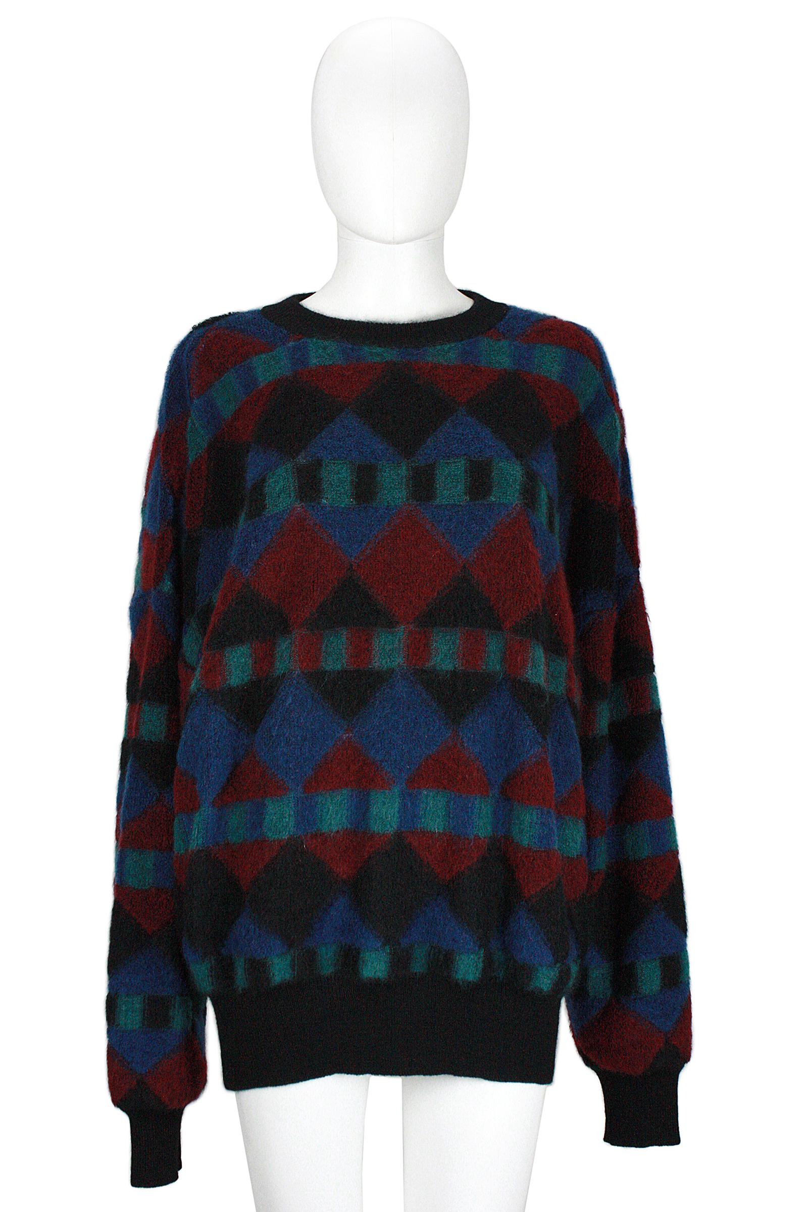 Missoni 
Knit sweater 
Knit stripe trim 
Crew neck 
Soft weave that stretches 
Mohair blend
Geometric pattern