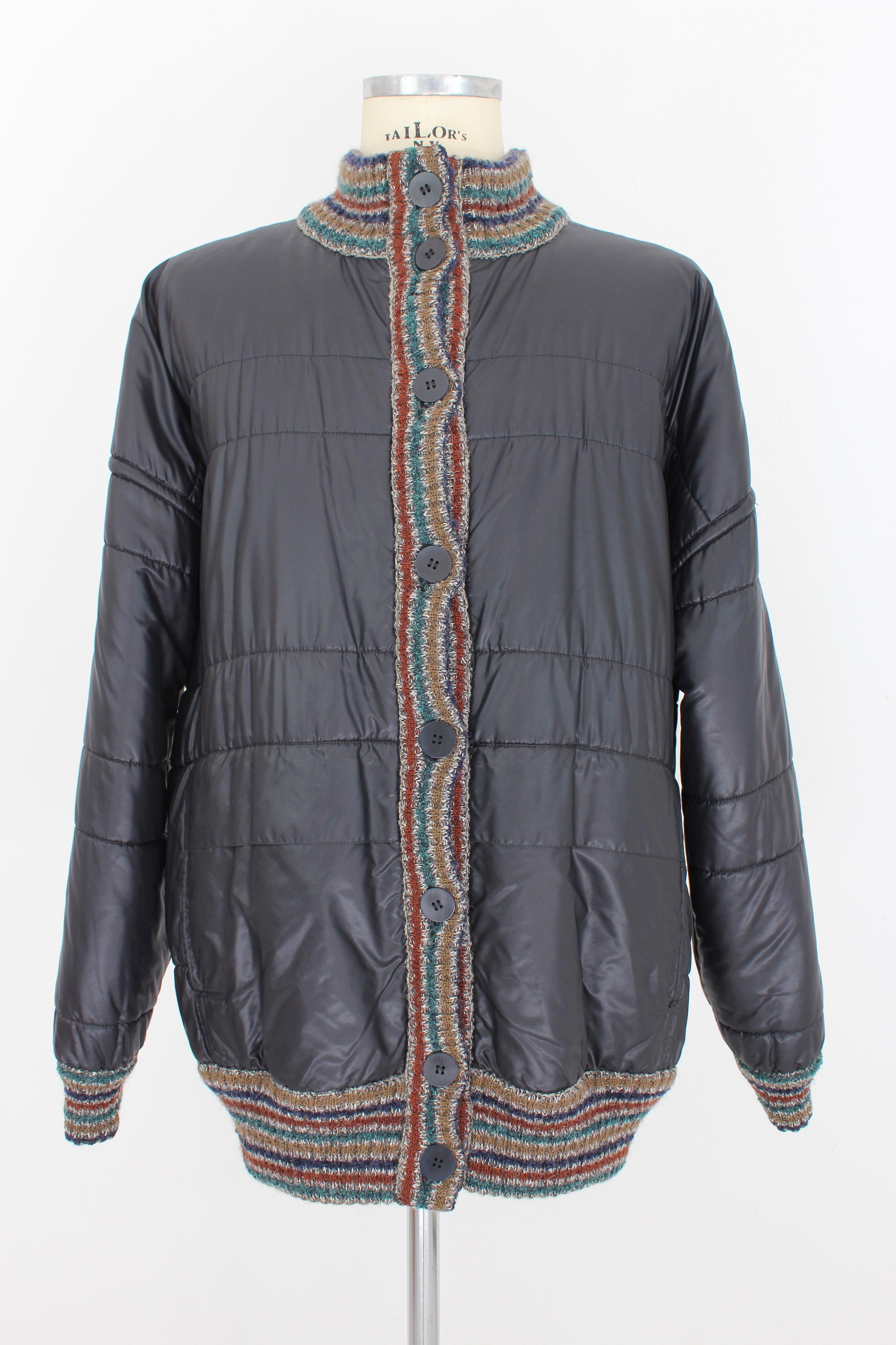 Missoni vintage 80s men's jacket. Double face jacket, alpaca and mohair wool on one side, padded down on the other side. Green and blue color with paisley pattern. Button closure, side pockets. Made in Italy

Condition: Very good

Item in excellent
